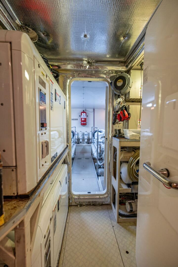 a bathroom with a large mirror aboard CRYSTAL PARROT Yacht for Sale