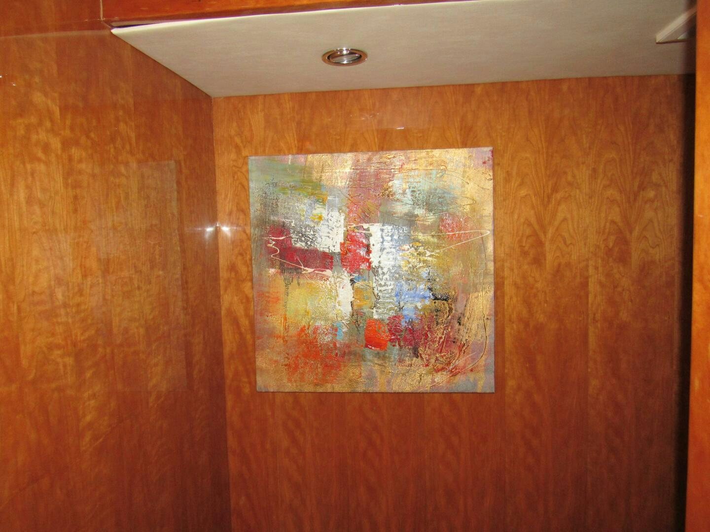 a painting on a wall aboard MOJITO Yacht for Sale