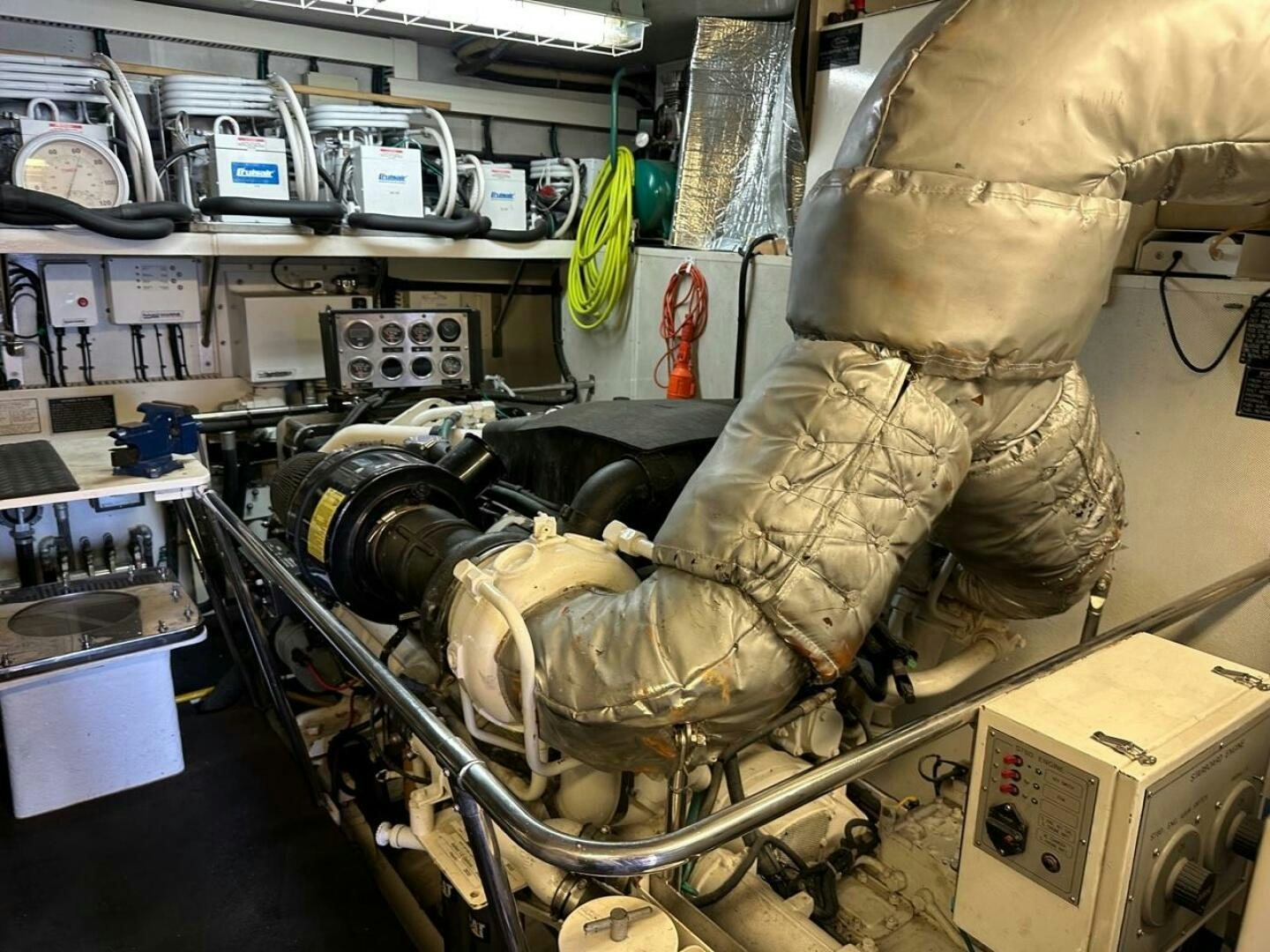 a person in a camouflage uniform aboard MOJITO Yacht for Sale