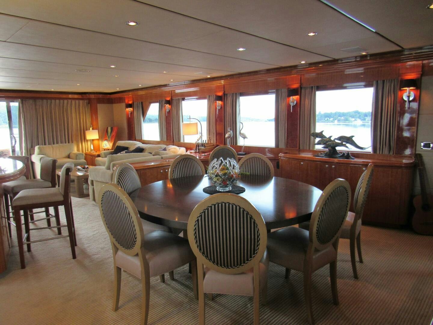 a dining table in a room aboard MOJITO Yacht for Sale