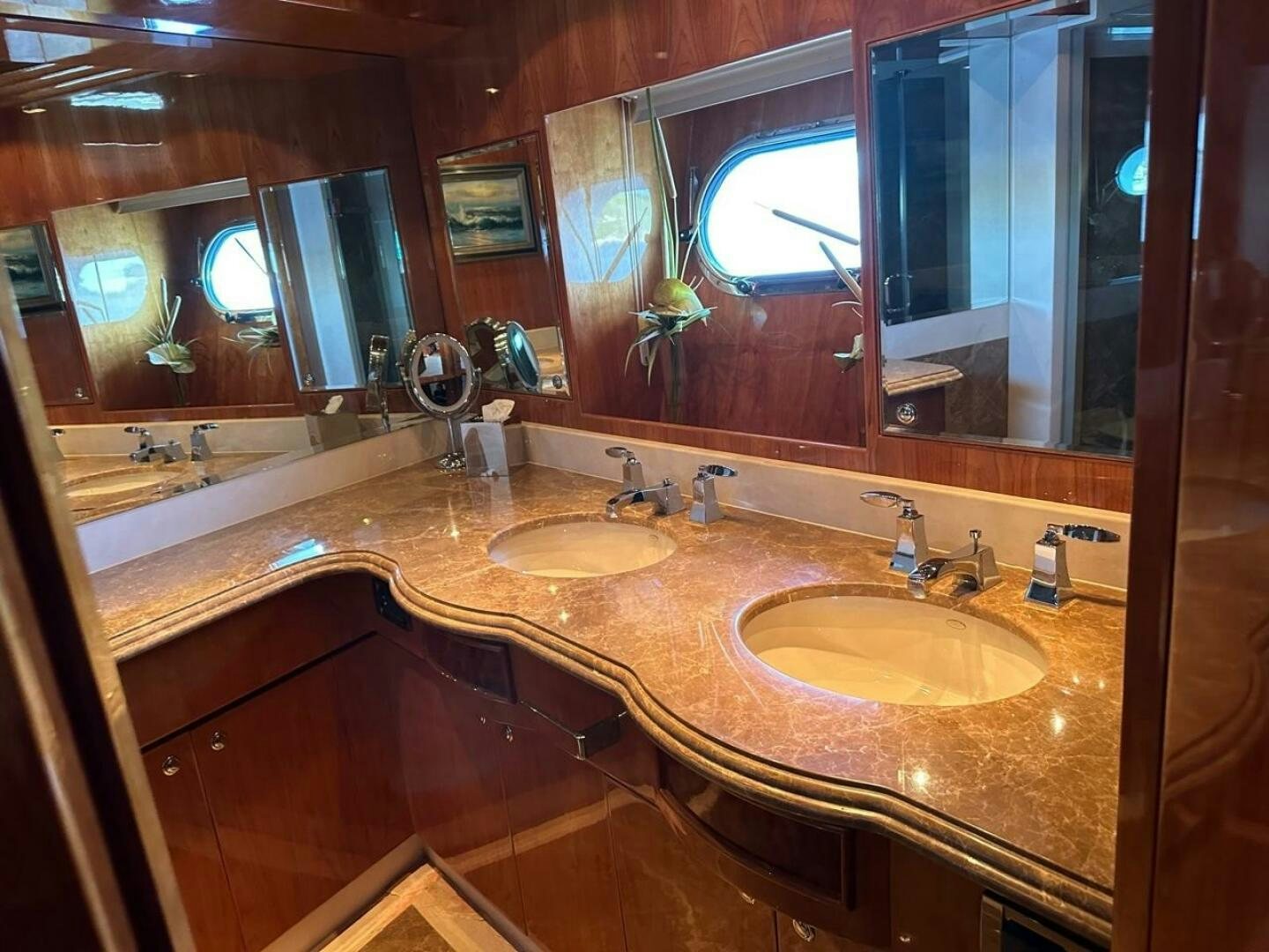 a bathroom with two sinks aboard MOJITO Yacht for Sale