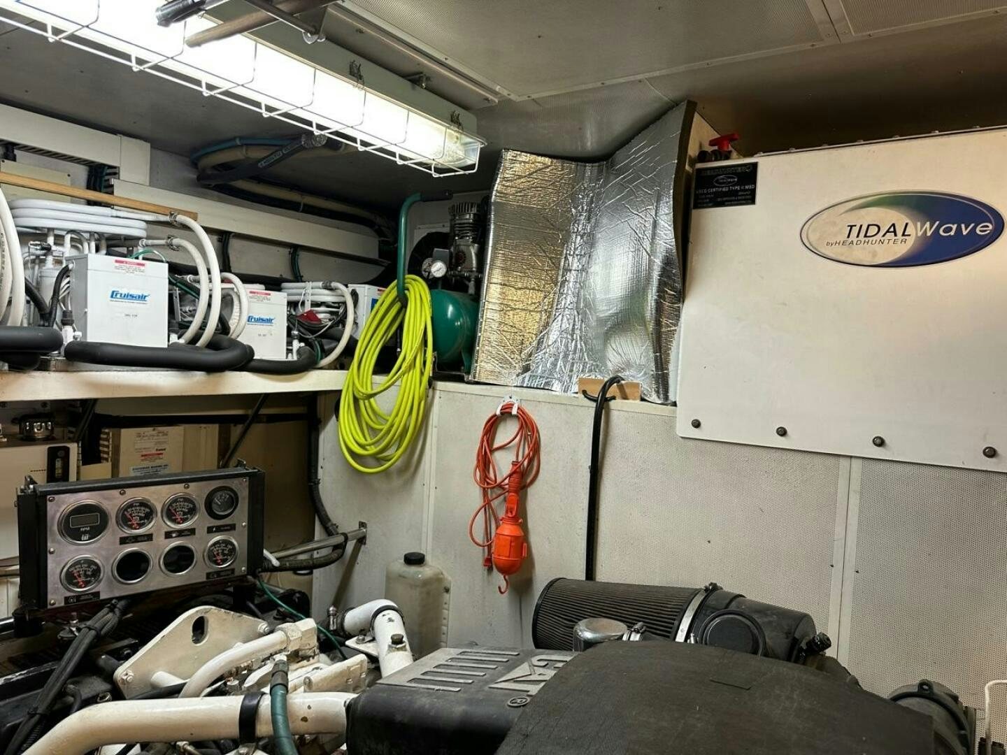 a room with a few bikes aboard MOJITO Yacht for Sale