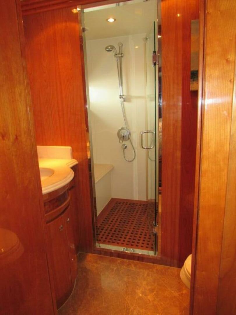 a bathroom with a shower unit and sink aboard MOJITO Yacht for Sale
