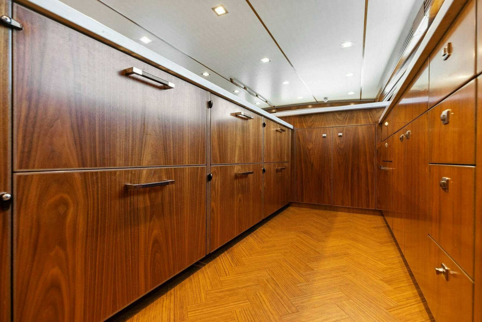 a large wooden cabinet aboard WHISKEY PAPA Yacht for Sale