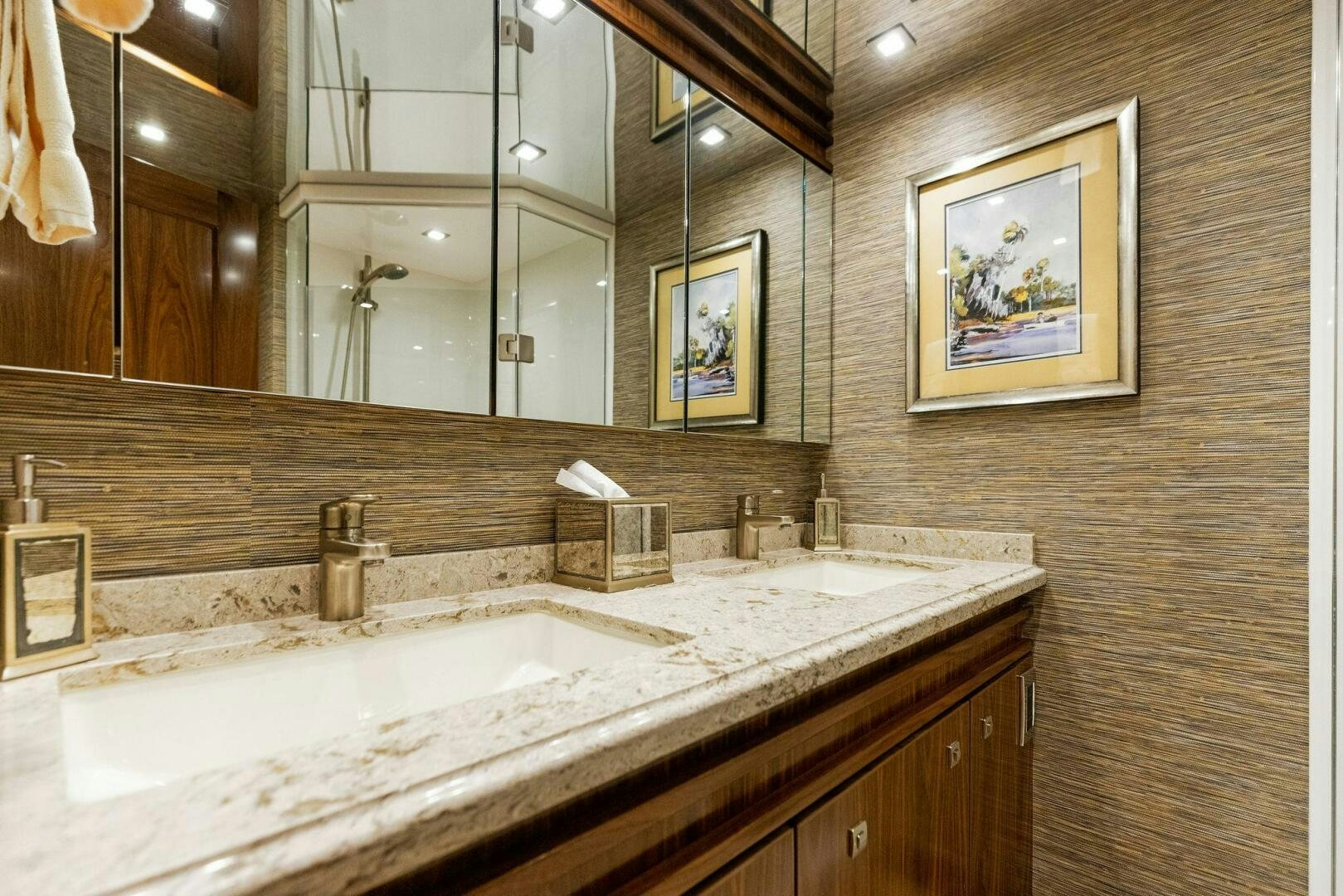 a bathroom with a large mirror aboard WHISKEY PAPA Yacht for Sale