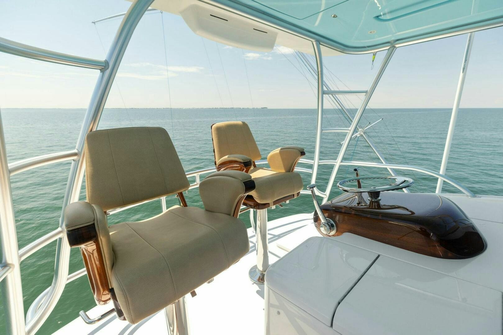 a boat with chairs and a table on it aboard WHISKEY PAPA Yacht for Sale
