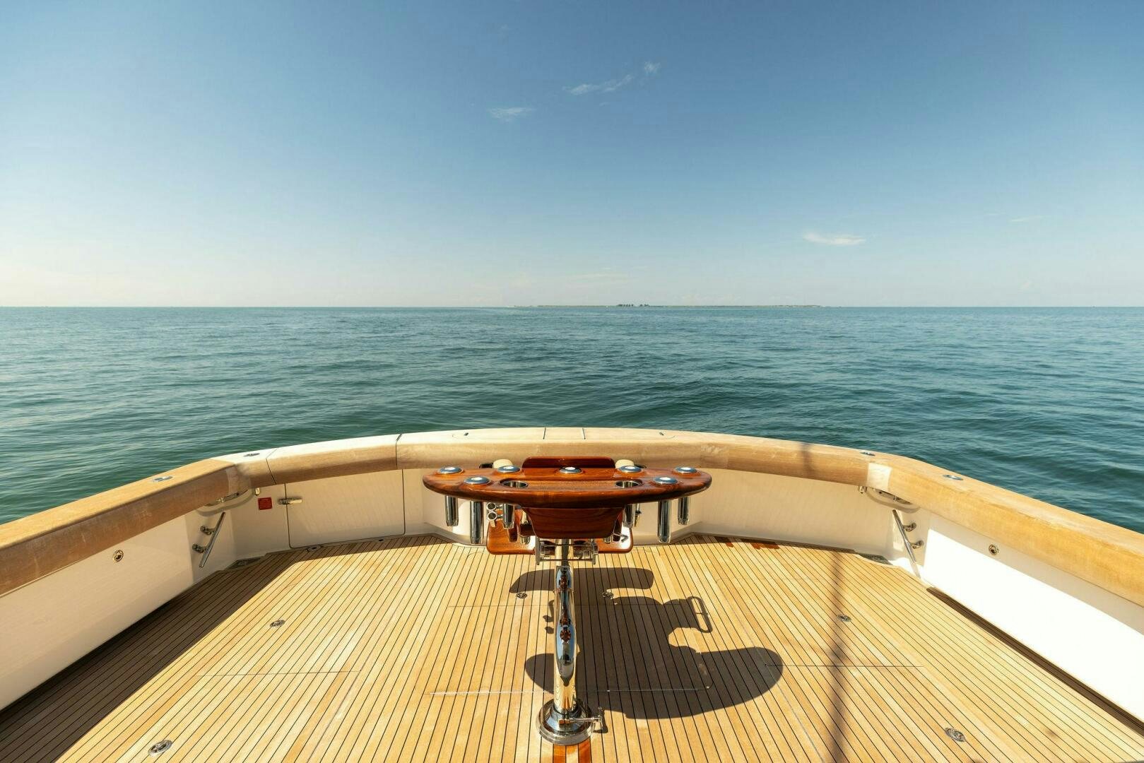 a wooden table on a boat aboard WHISKEY PAPA Yacht for Sale