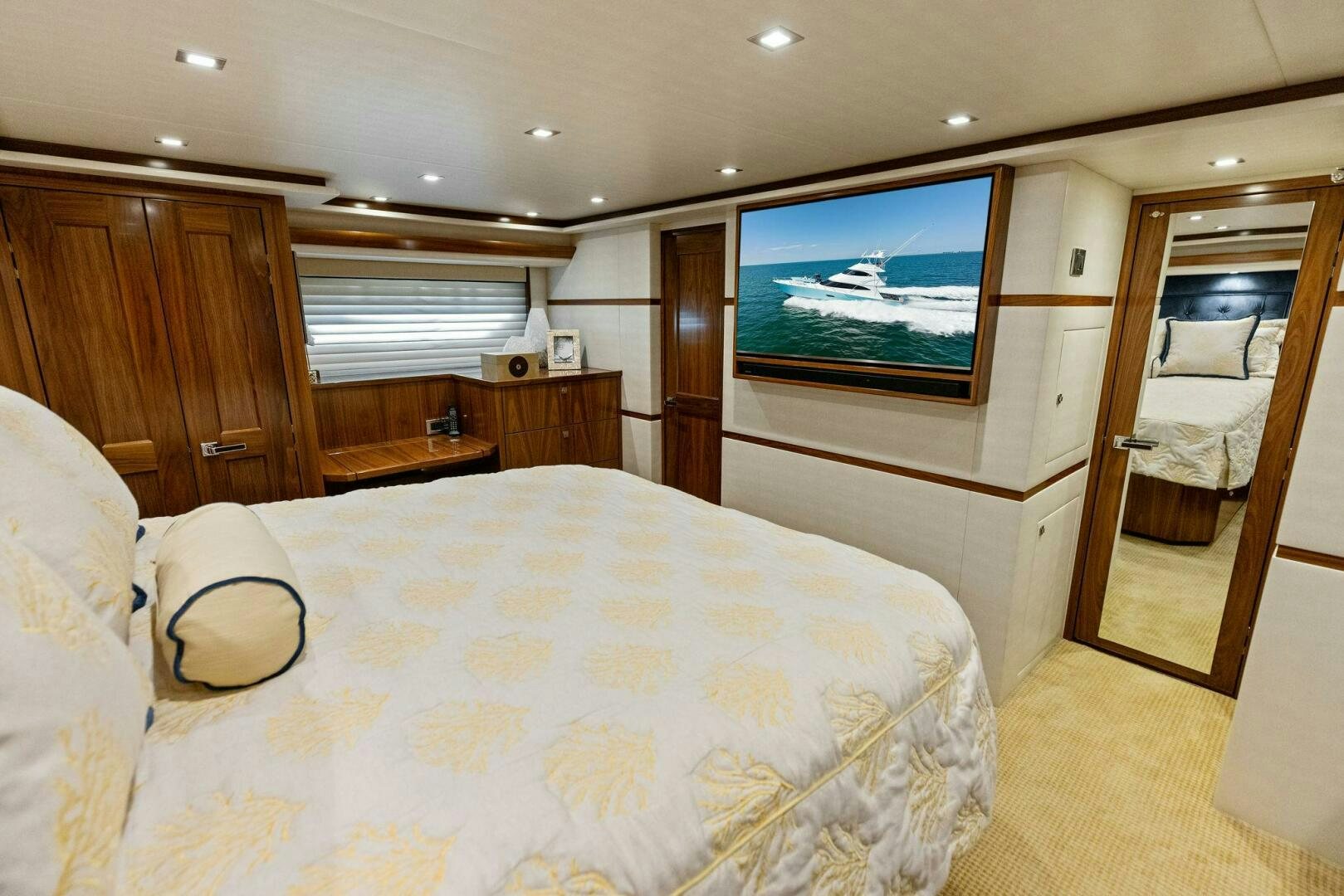 a hotel room with a large television aboard WHISKEY PAPA Yacht for Sale