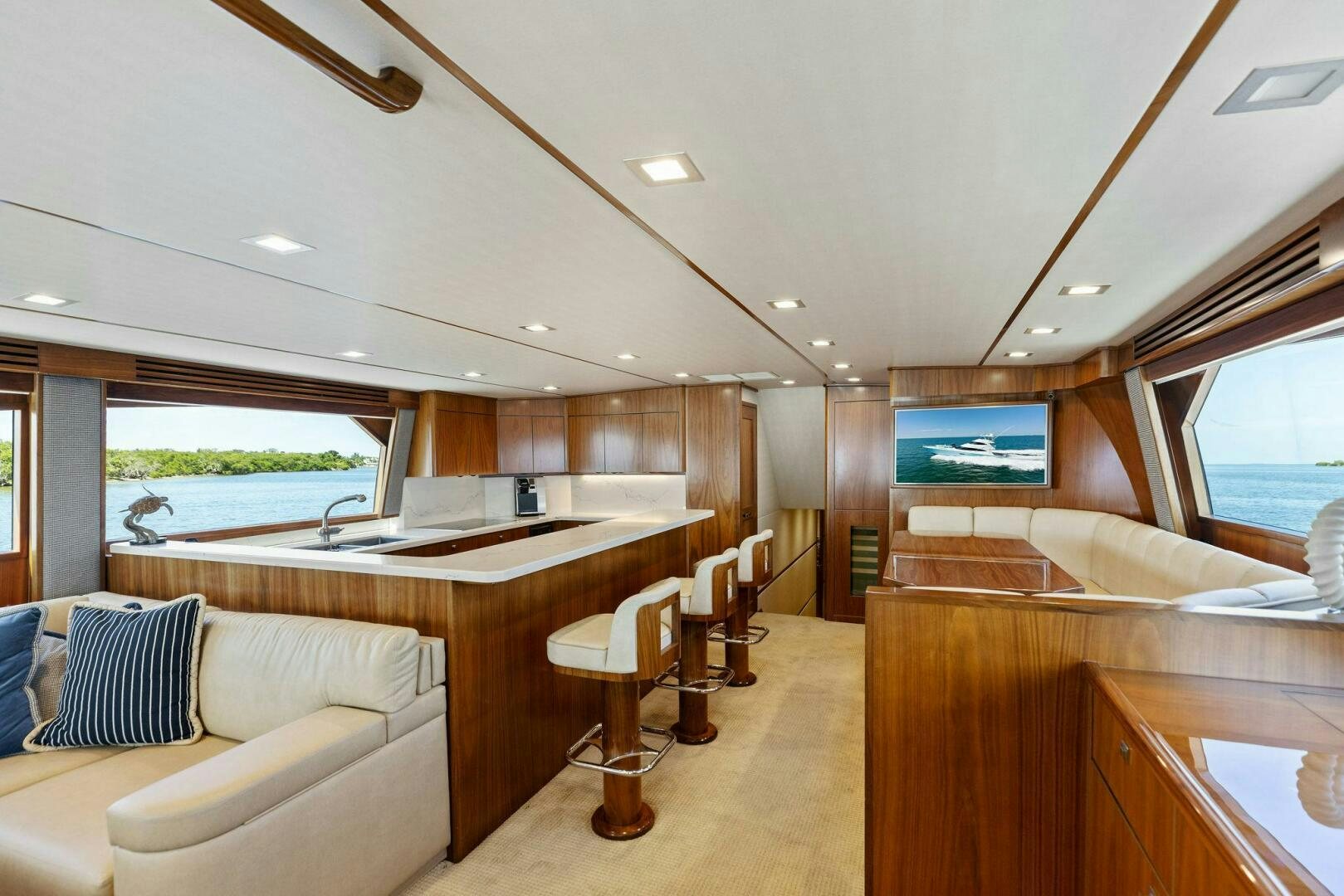 a large kitchen and living room aboard WHISKEY PAPA Yacht for Sale