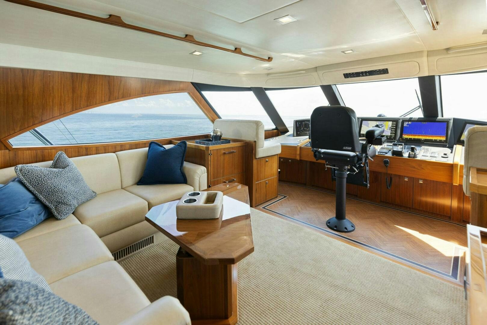 a room with a couch and a desk aboard WHISKEY PAPA Yacht for Sale