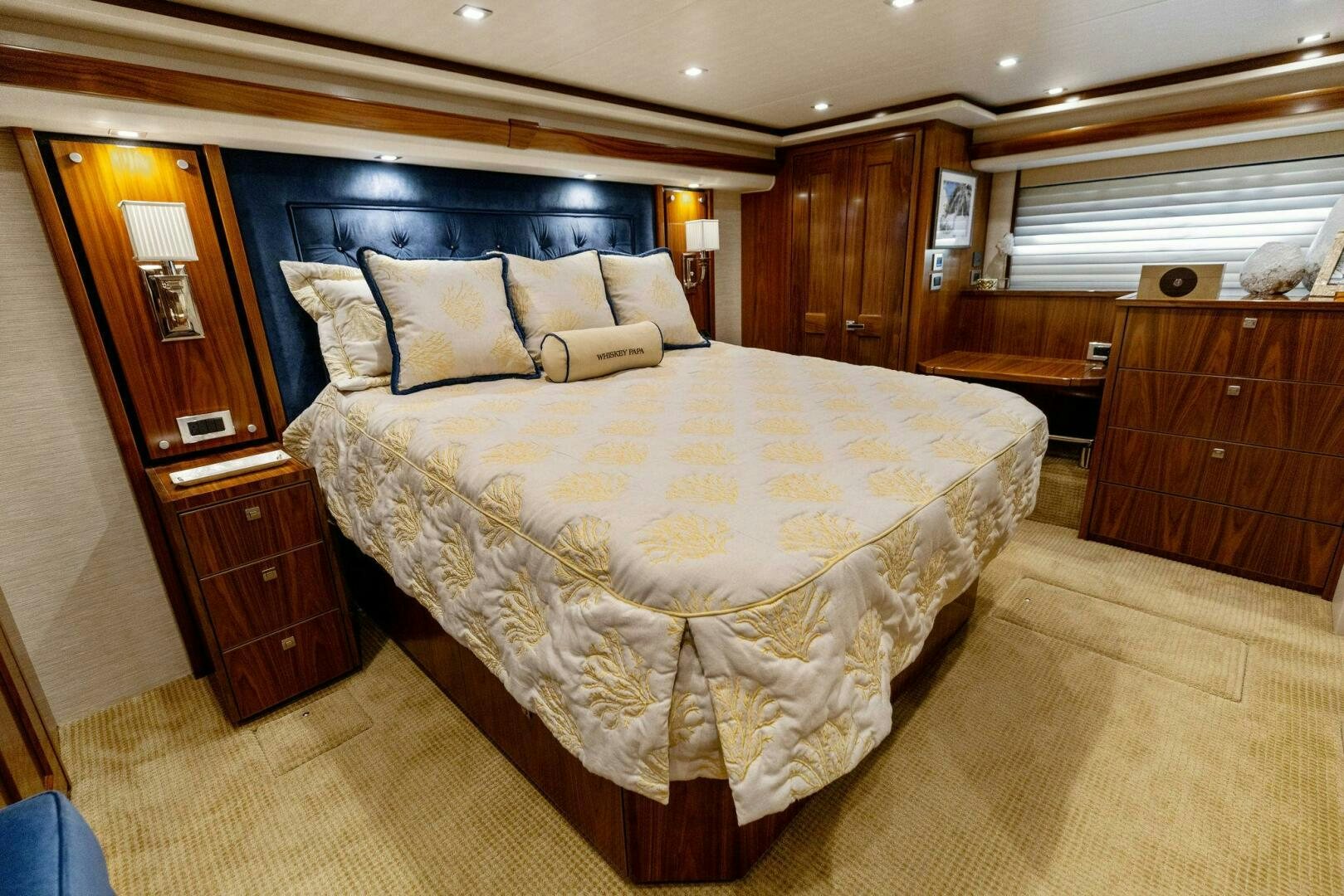 a large bed in a room aboard WHISKEY PAPA Yacht for Sale
