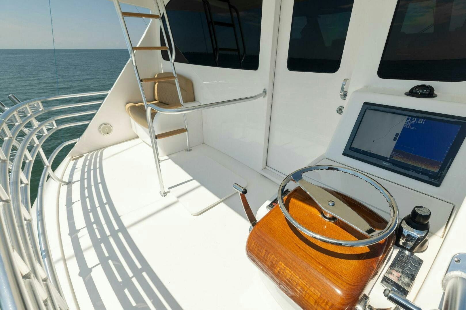a glass of beer on a boat aboard WHISKEY PAPA Yacht for Sale