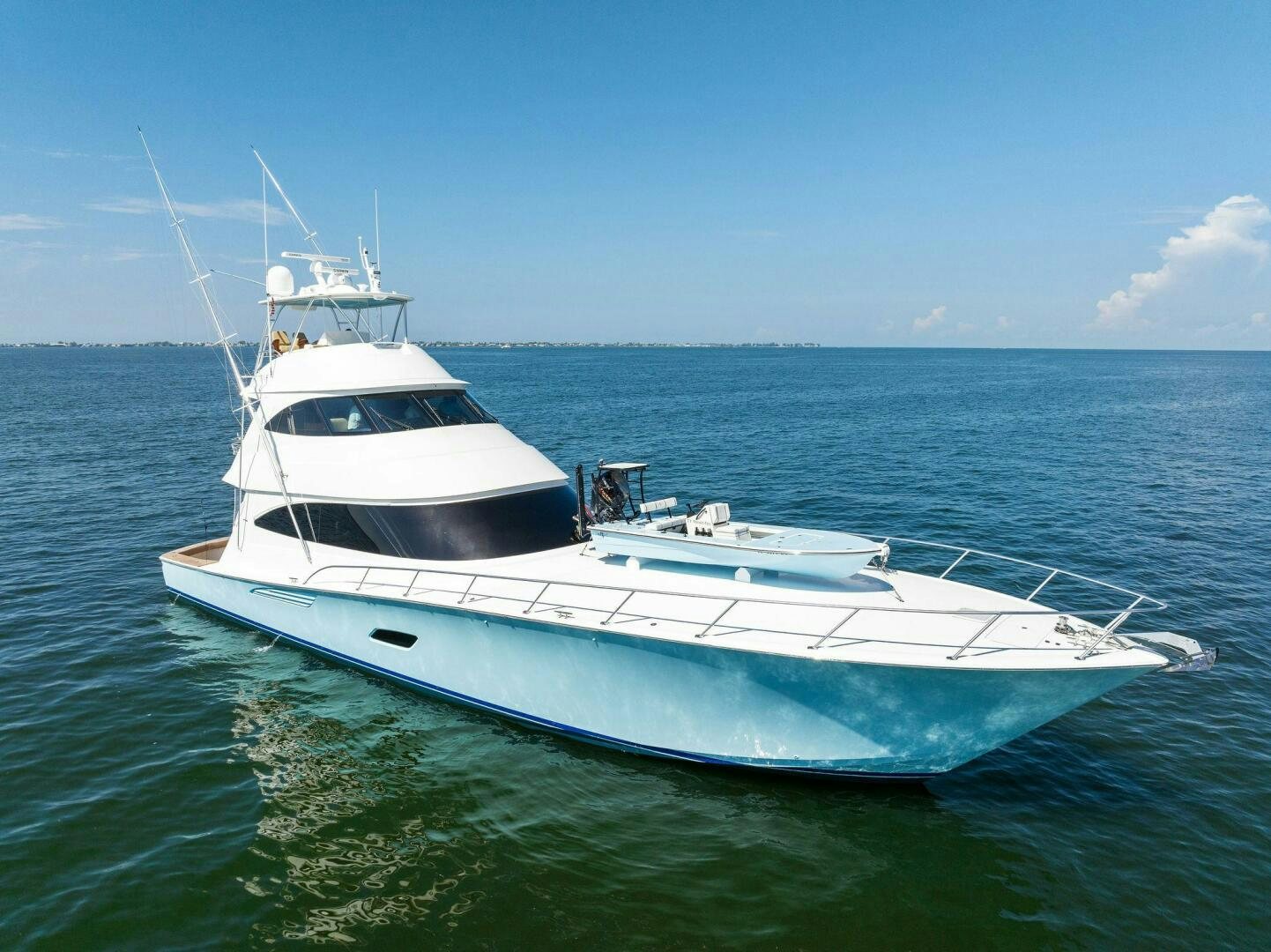 a white yacht in the water aboard WHISKEY PAPA Yacht for Sale