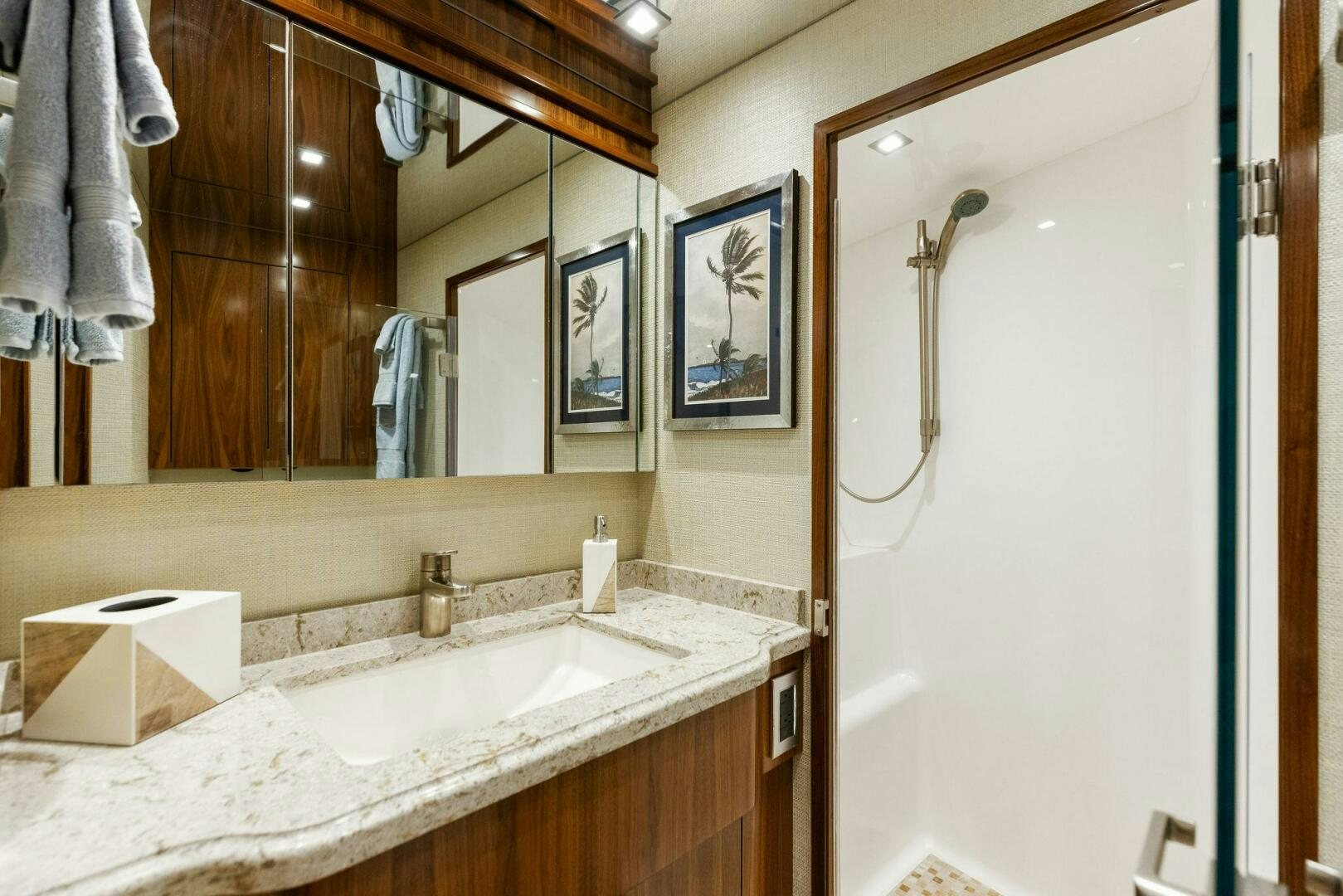 a bathroom with a sink and a mirror aboard WHISKEY PAPA Yacht for Sale