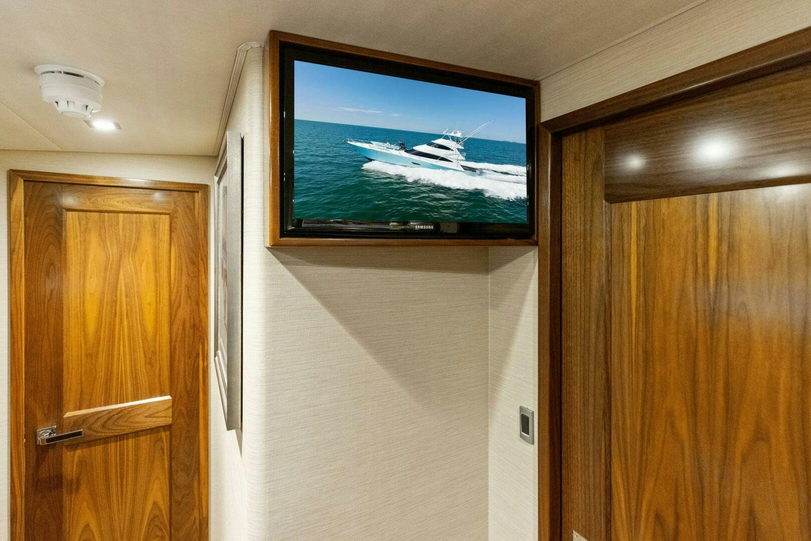 a tv on a wall aboard WHISKEY PAPA Yacht for Sale