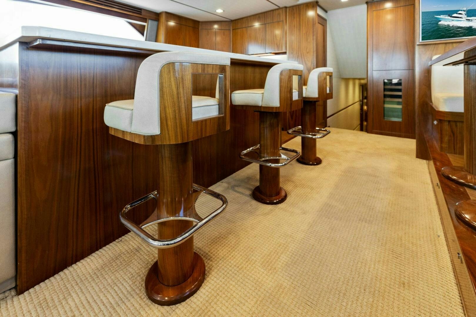 a room with a table and chairs aboard WHISKEY PAPA Yacht for Sale
