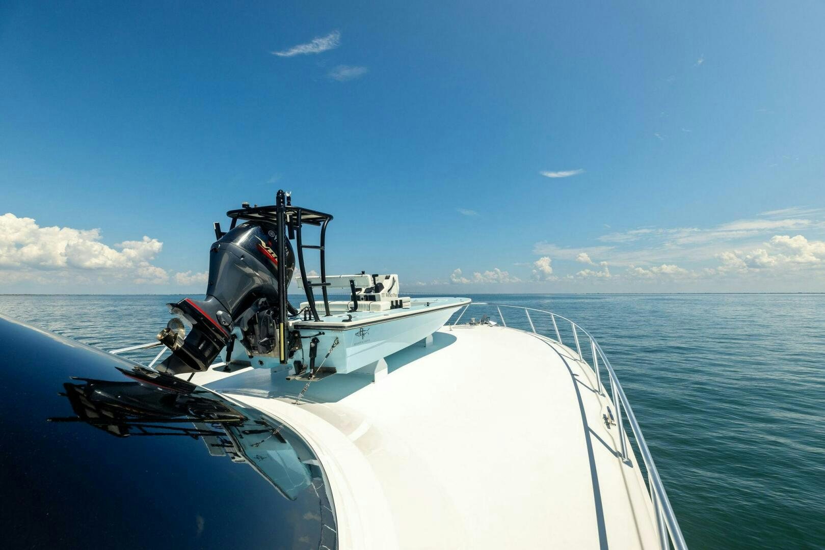 a boat with a machine on the front aboard WHISKEY PAPA Yacht for Sale