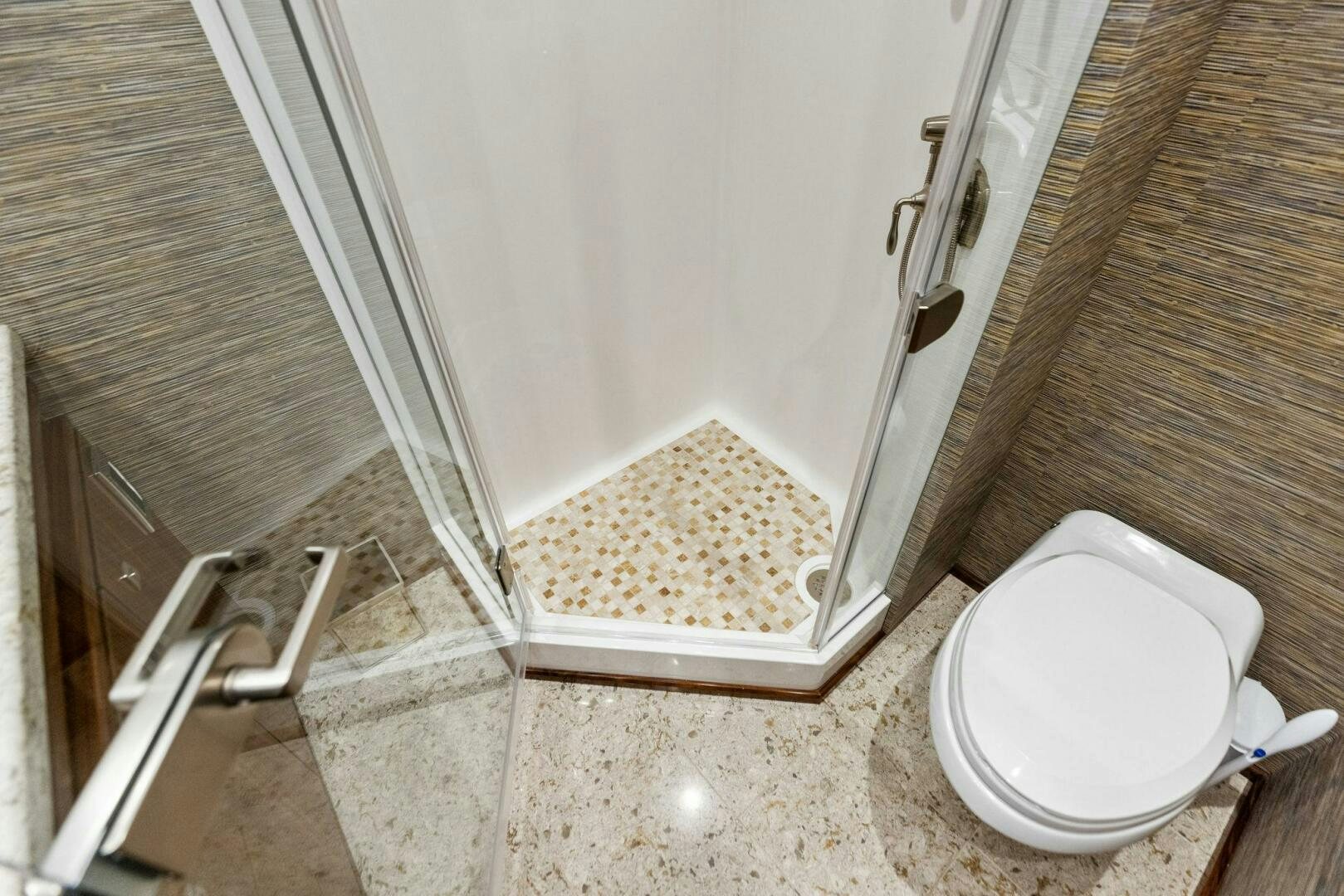 a toilet in a bathroom aboard WHISKEY PAPA Yacht for Sale