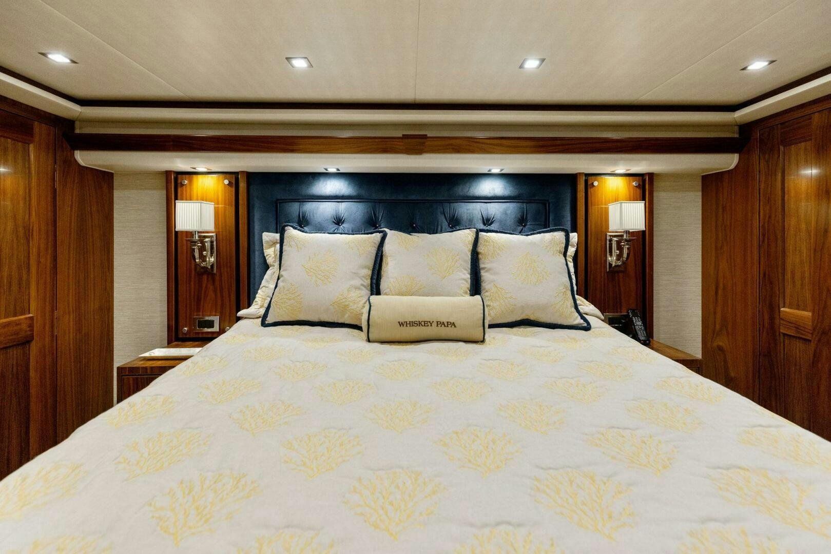 a bed with pillows aboard WHISKEY PAPA Yacht for Sale