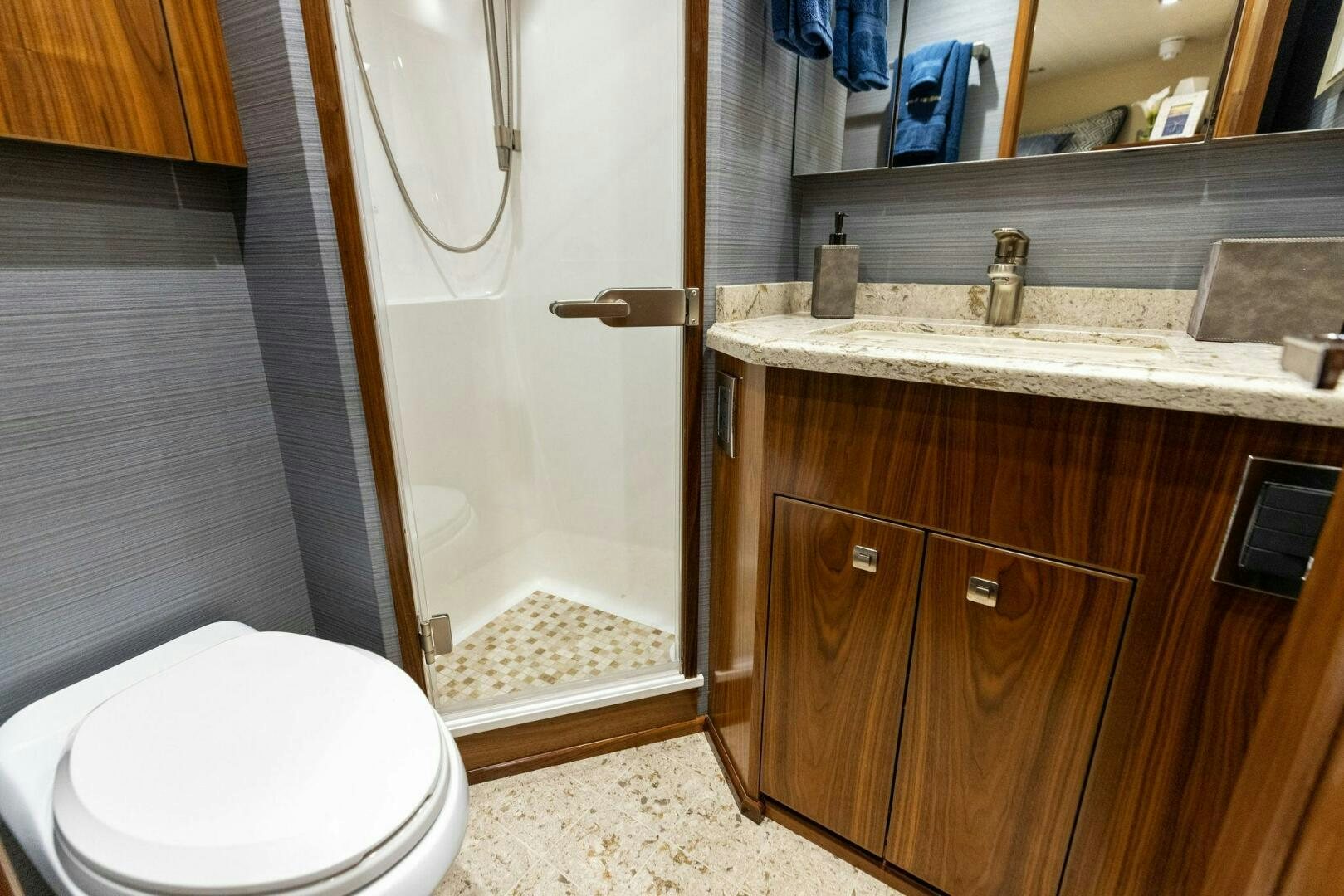 a bathroom with a sink and a toilet aboard WHISKEY PAPA Yacht for Sale