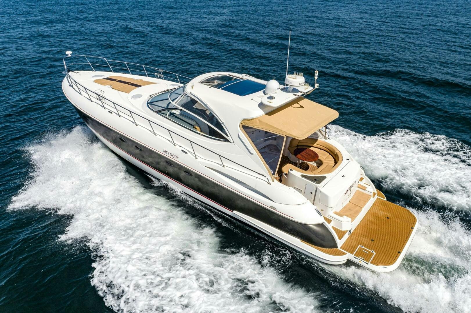 a boat on the water aboard MYSTIQUE Yacht for Sale