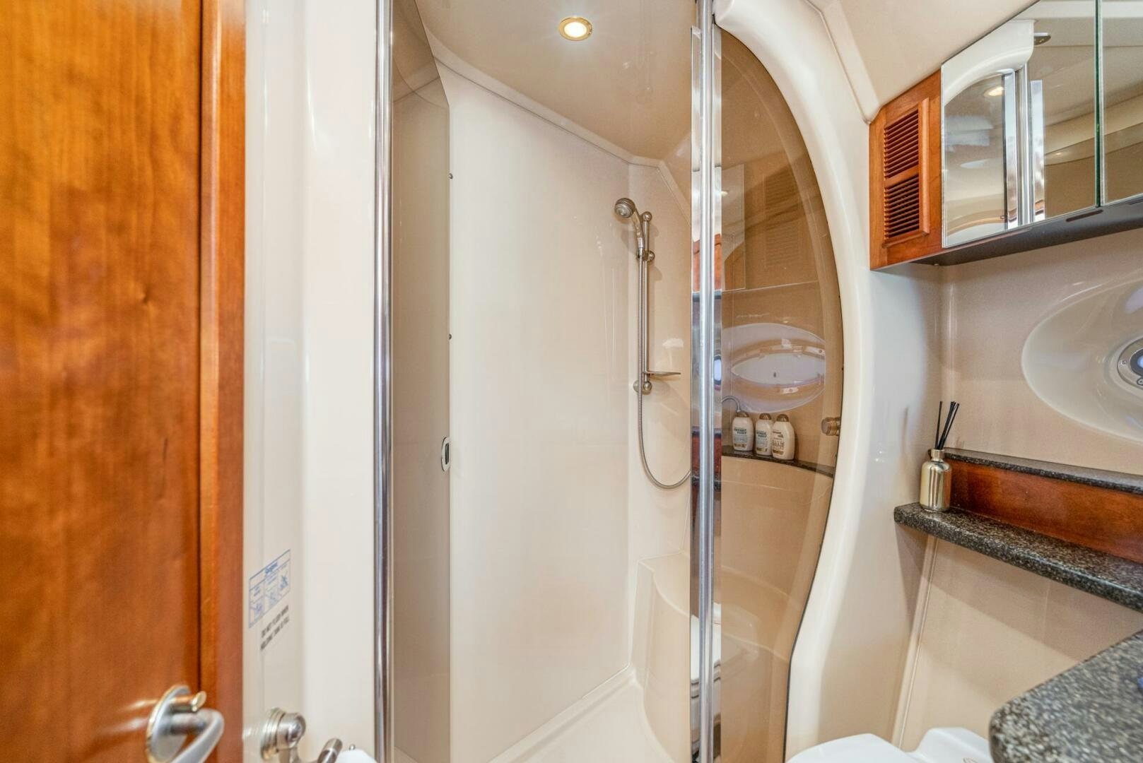 a shower unit in a bathroom aboard MYSTIQUE Yacht for Sale
