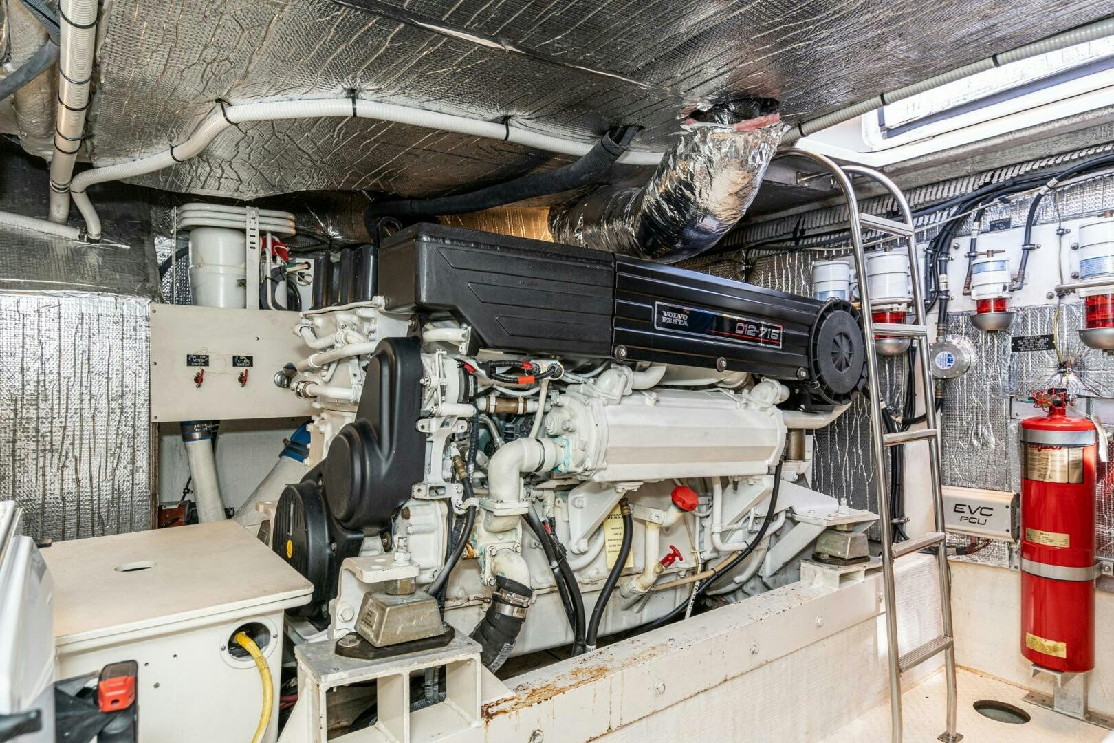 a large machine with many parts aboard MYSTIQUE Yacht for Sale