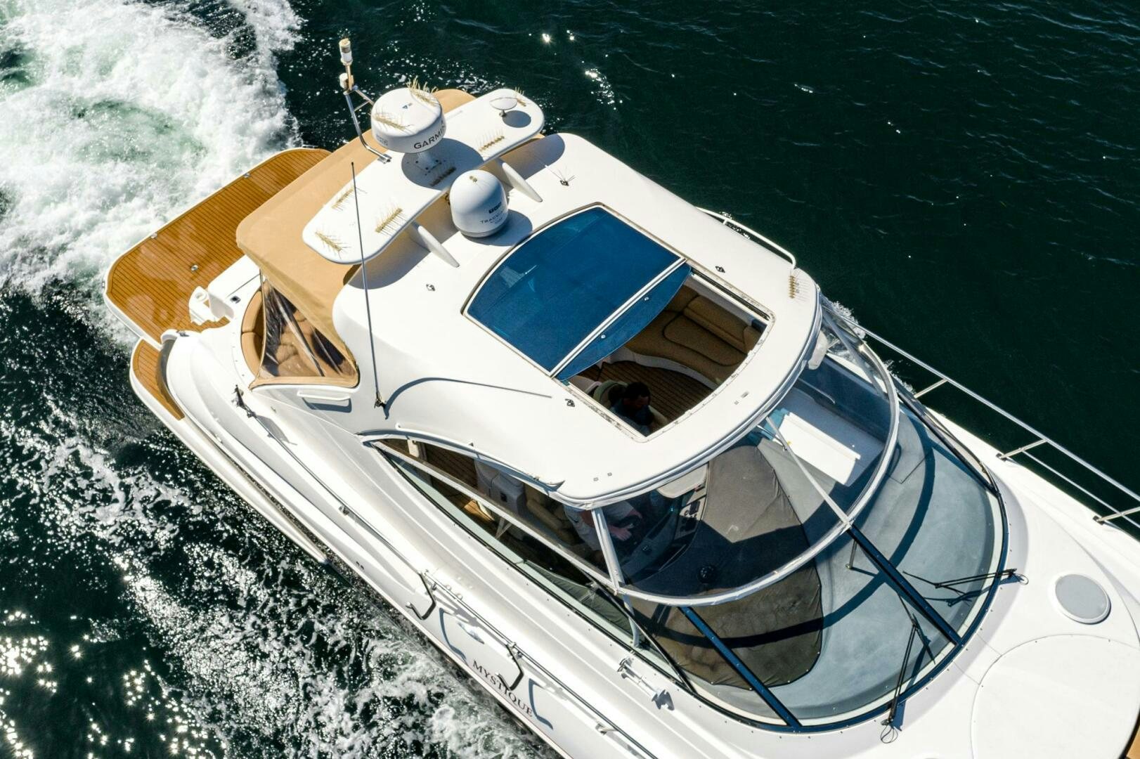 a boat on the water aboard MYSTIQUE Yacht for Sale