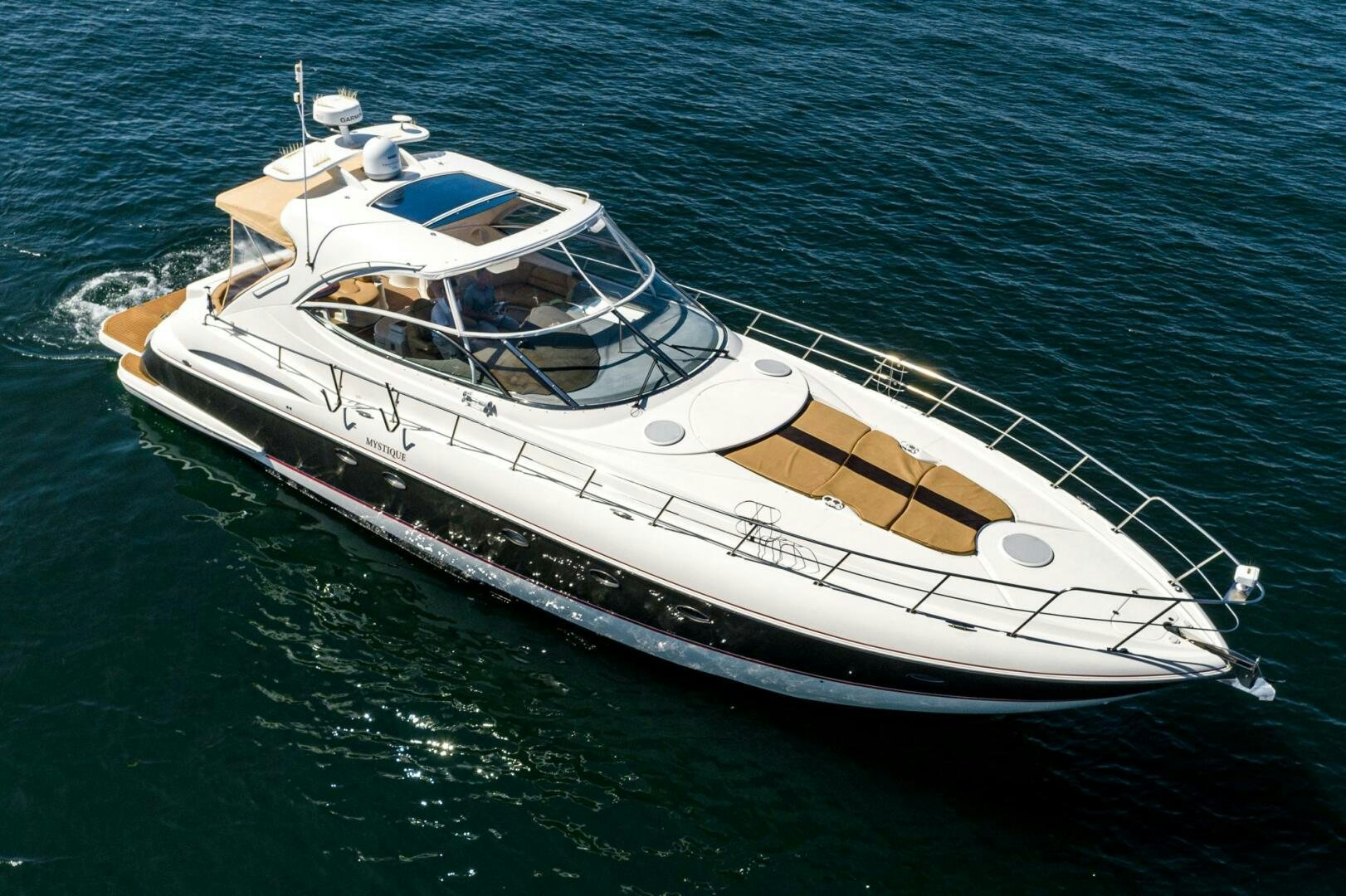 a boat on the water aboard MYSTIQUE Yacht for Sale