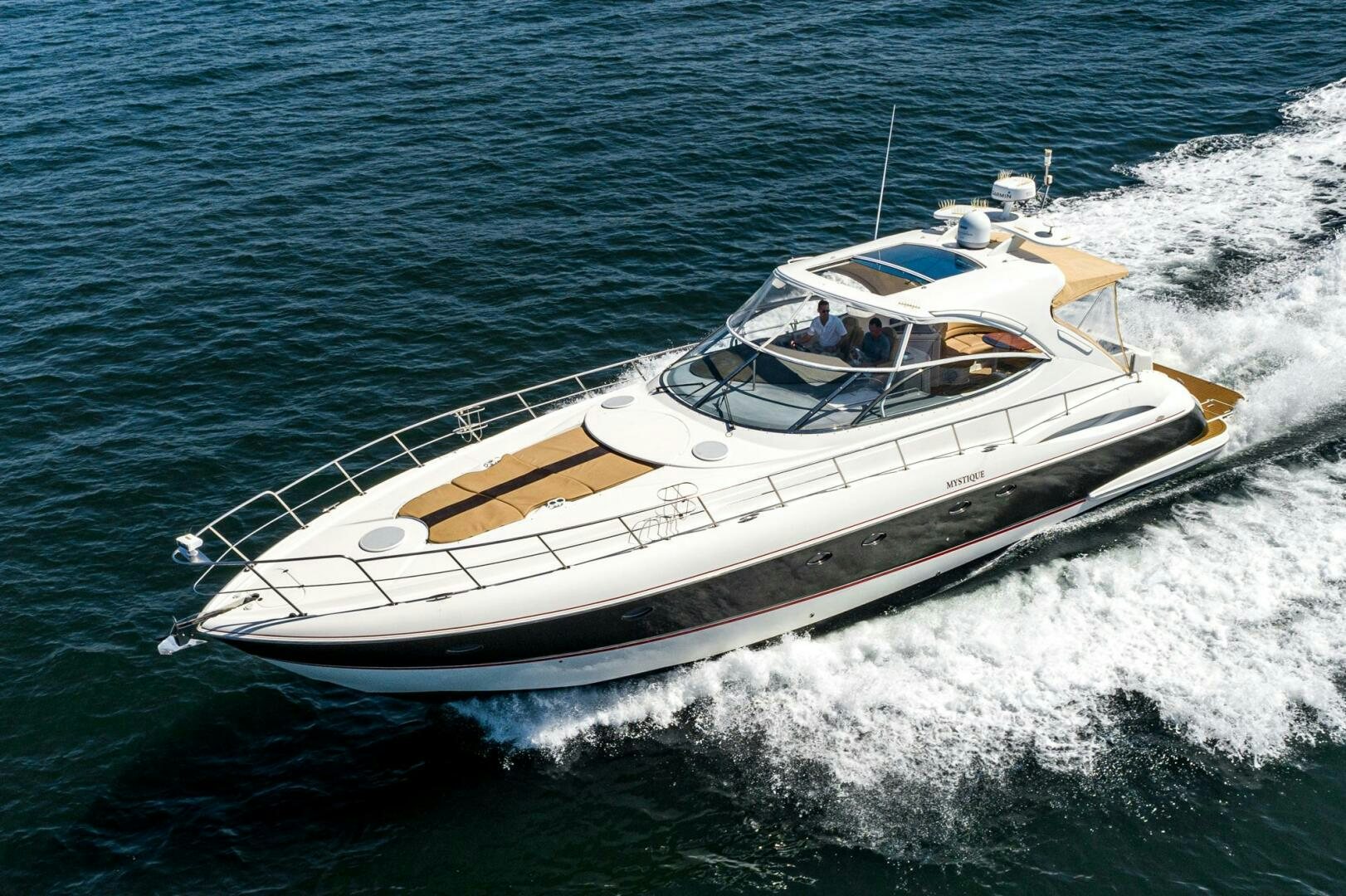 a boat on the water aboard MYSTIQUE Yacht for Sale