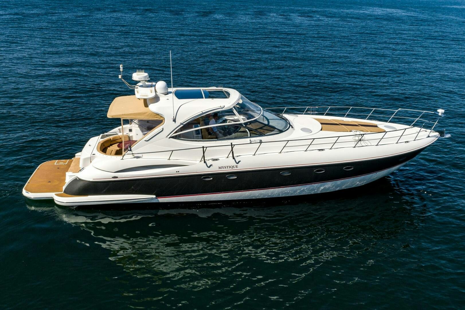 a boat in the water aboard MYSTIQUE Yacht for Sale