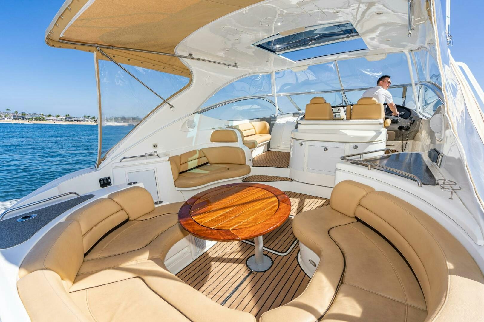 a person sitting on a boat aboard MYSTIQUE Yacht for Sale