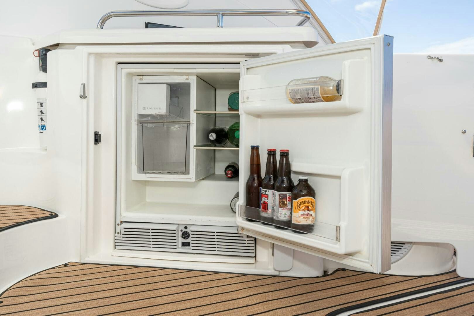a small refrigerator is open aboard MYSTIQUE Yacht for Sale