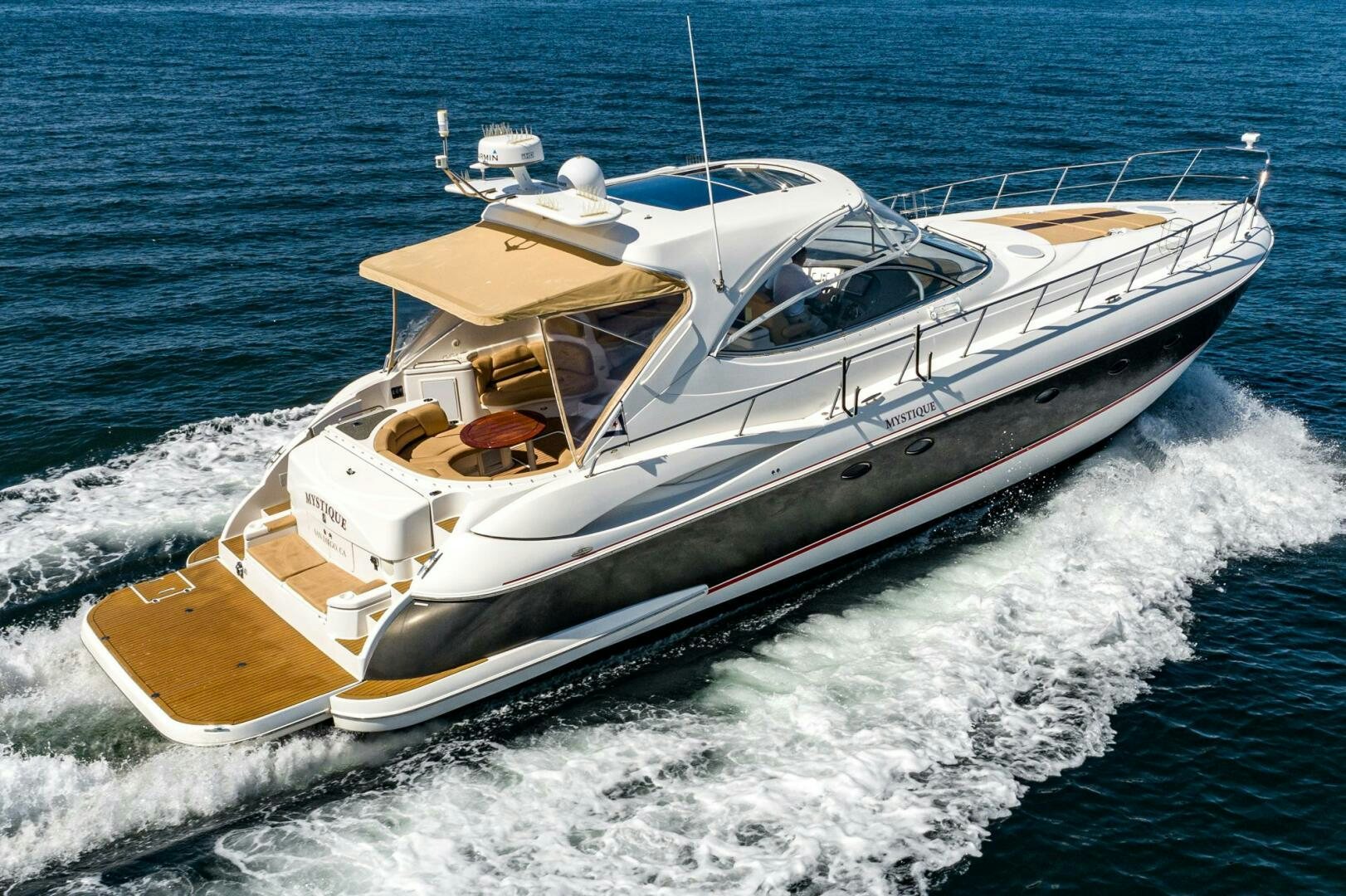 a boat on the water aboard MYSTIQUE Yacht for Sale