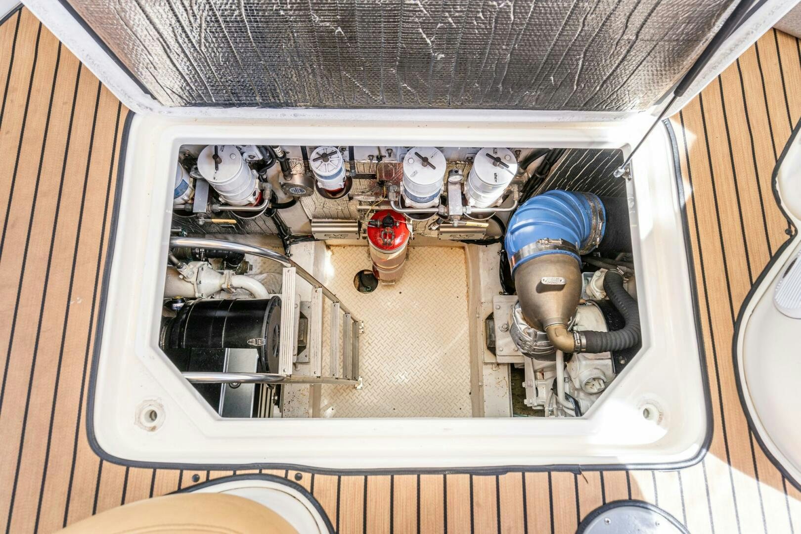 a white object with a blue object in it aboard MYSTIQUE Yacht for Sale