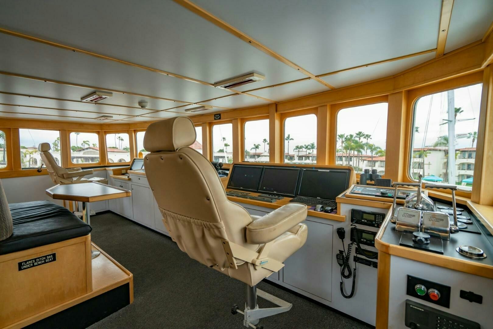a room with a chair and desk aboard PACIFIC PROVIDER Yacht for Sale
