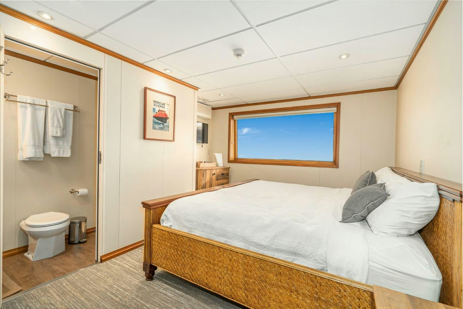 a bed in a room aboard PACIFIC PROVIDER Yacht for Sale