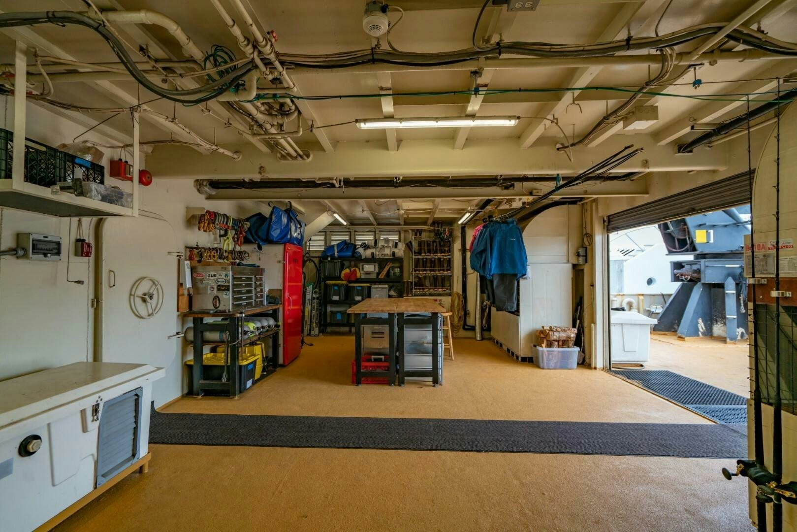 a room with a lot of equipment aboard PACIFIC PROVIDER Yacht for Sale