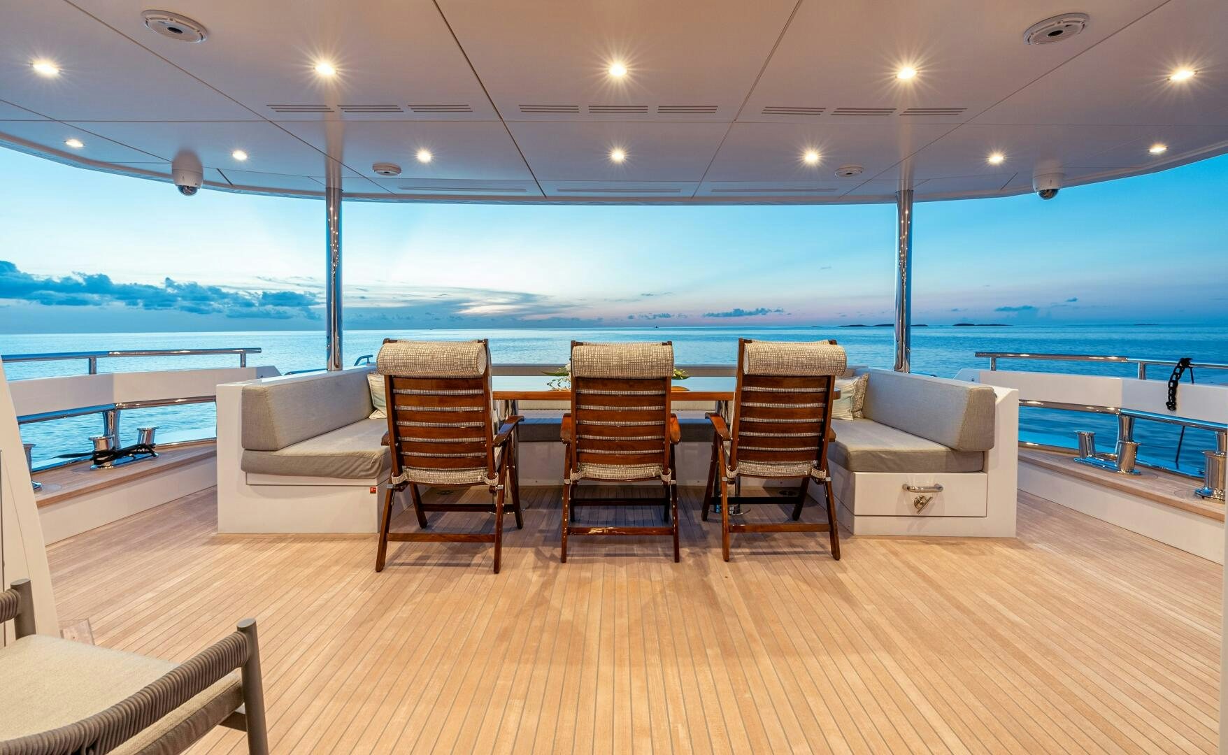 a room with a table and chairs aboard ROMEO FOXTROT Yacht for Sale