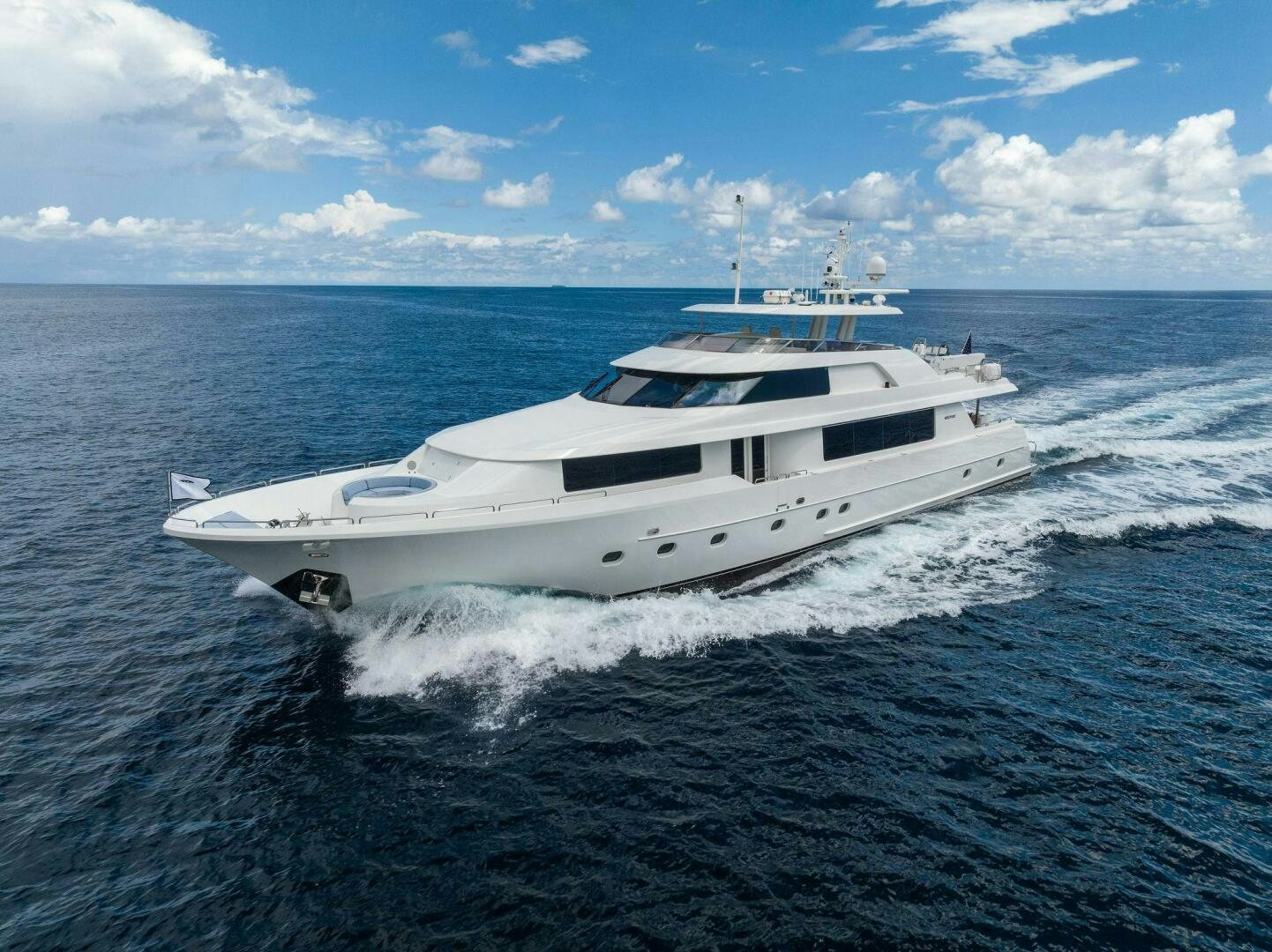 a white yacht in the water aboard JEANNIETINI NAME RESERVED Yacht for Sale