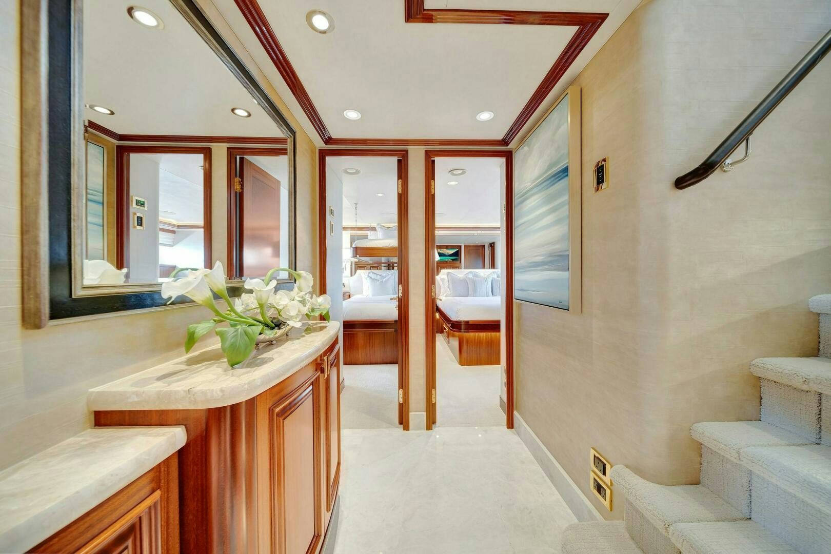 a bathroom with a sink and a mirror aboard JEANNIETINI NAME RESERVED Yacht for Sale