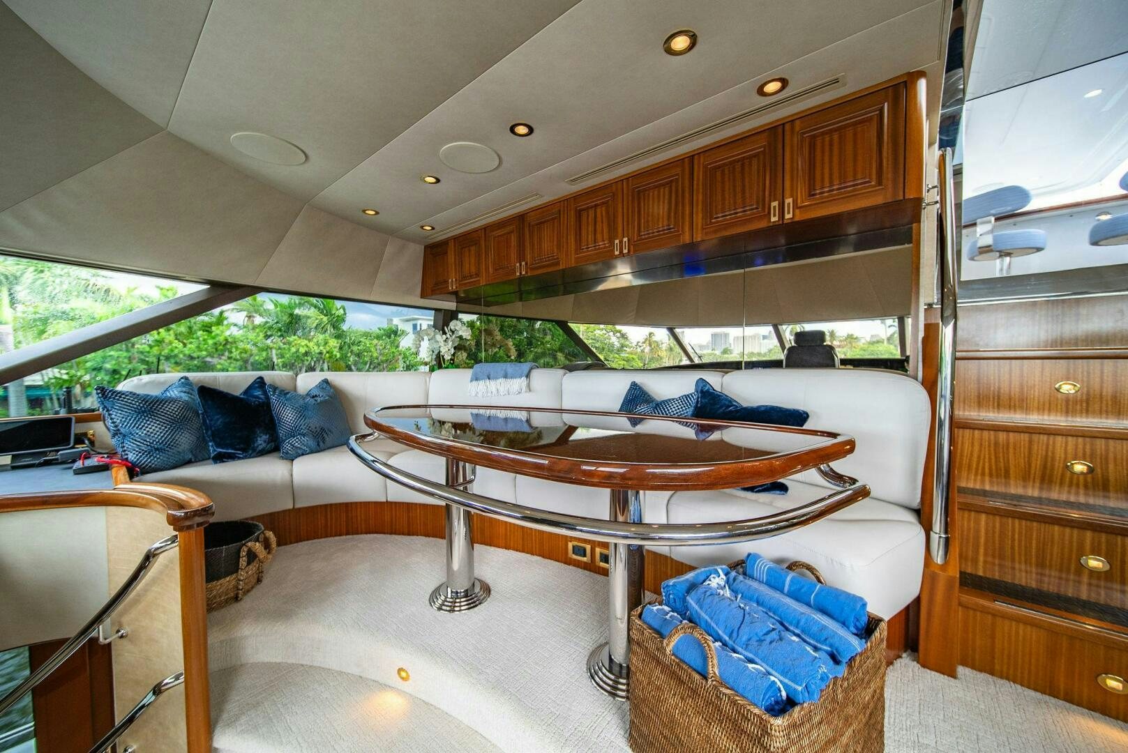 a room with a table and couch aboard JEANNIETINI NAME RESERVED Yacht for Sale