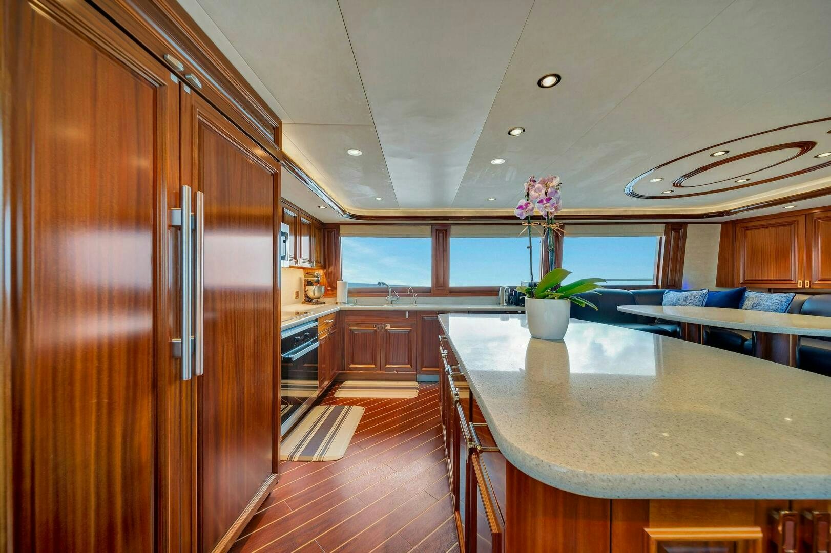 a kitchen with a large island aboard JEANNIETINI NAME RESERVED Yacht for Sale