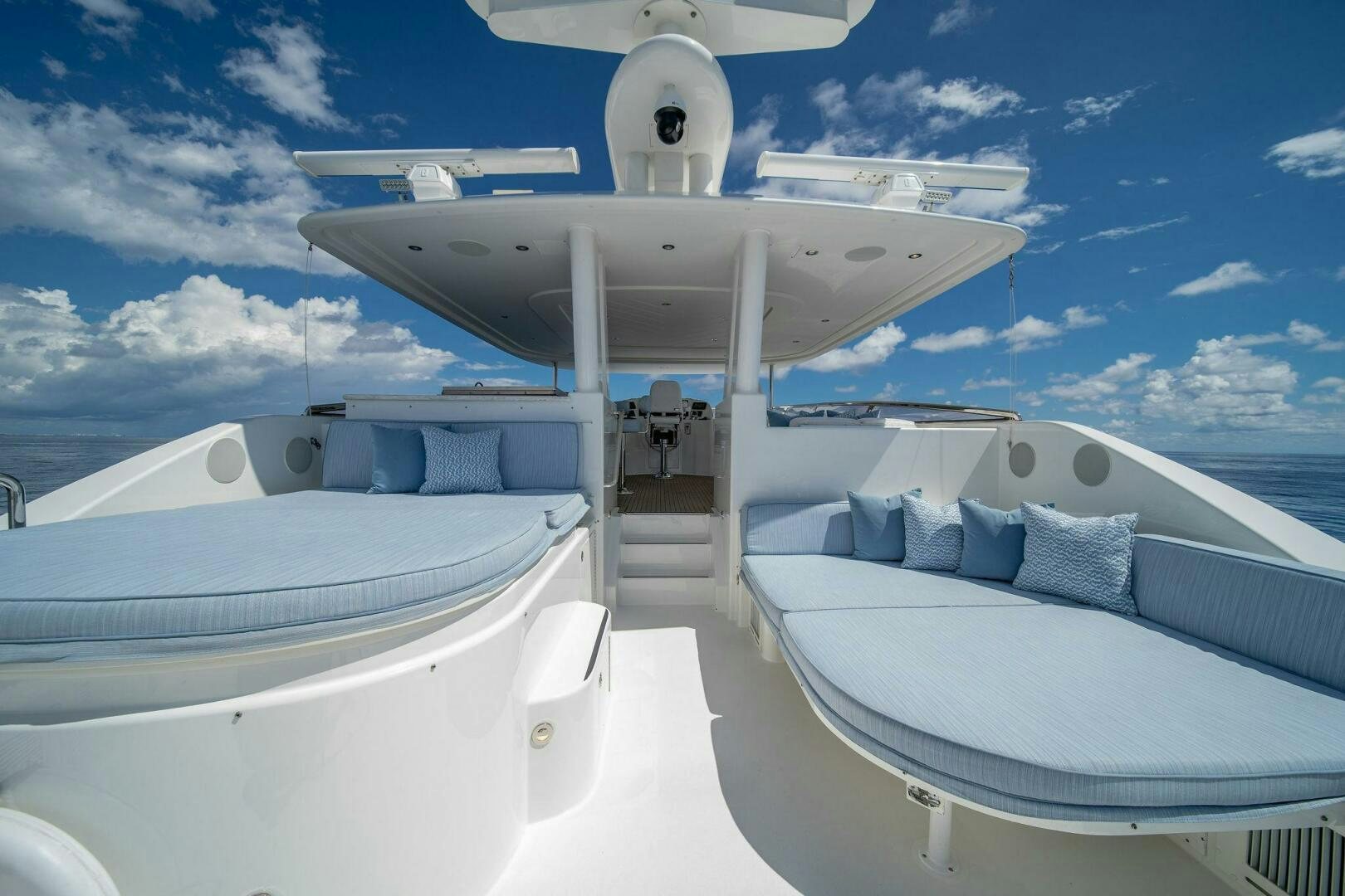 a white boat on a water body aboard JEANNIETINI NAME RESERVED Yacht for Sale