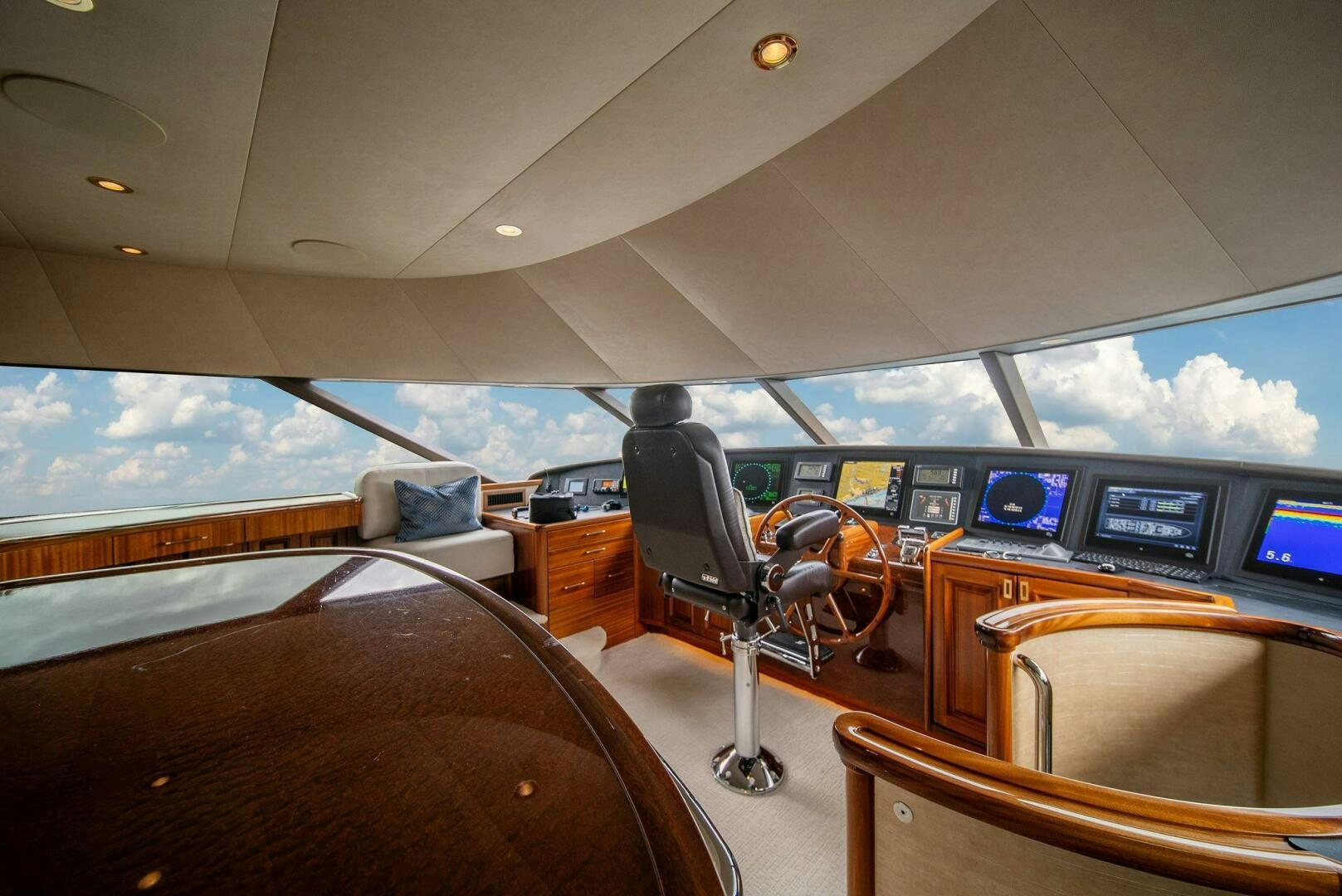 inside of a vehicle with a view of the mountains and the ocean aboard JEANNIETINI NAME RESERVED Yacht for Sale