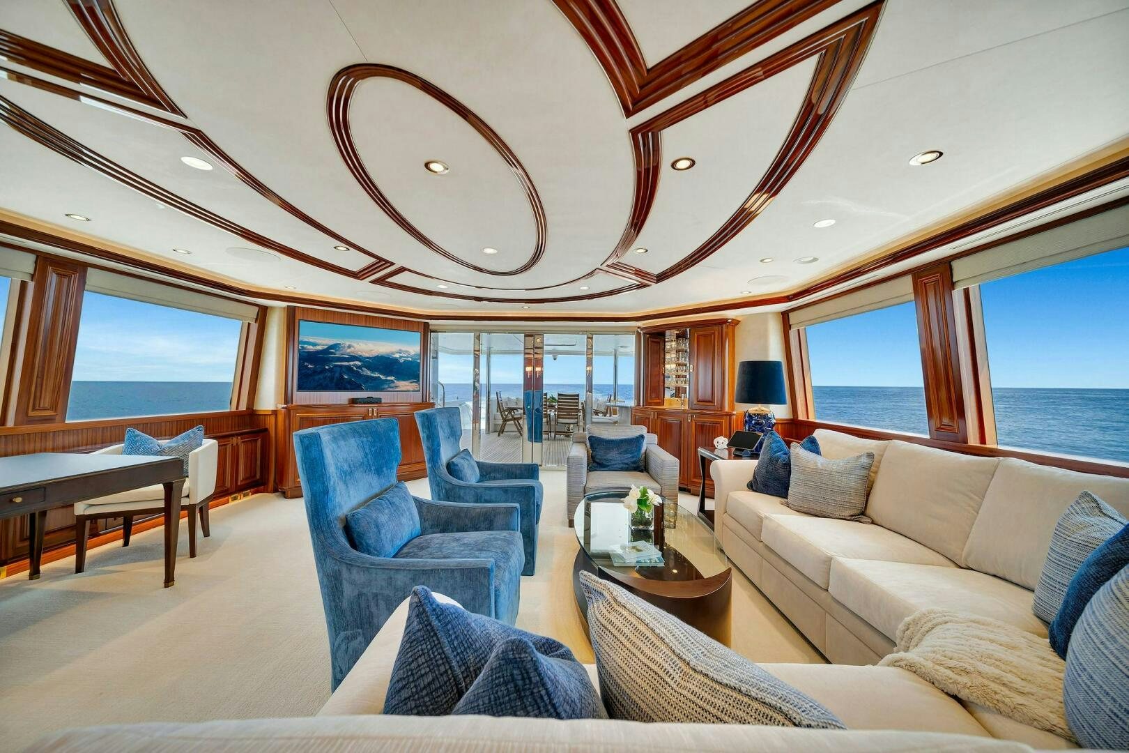 a living room with a large window aboard JEANNIETINI NAME RESERVED Yacht for Sale
