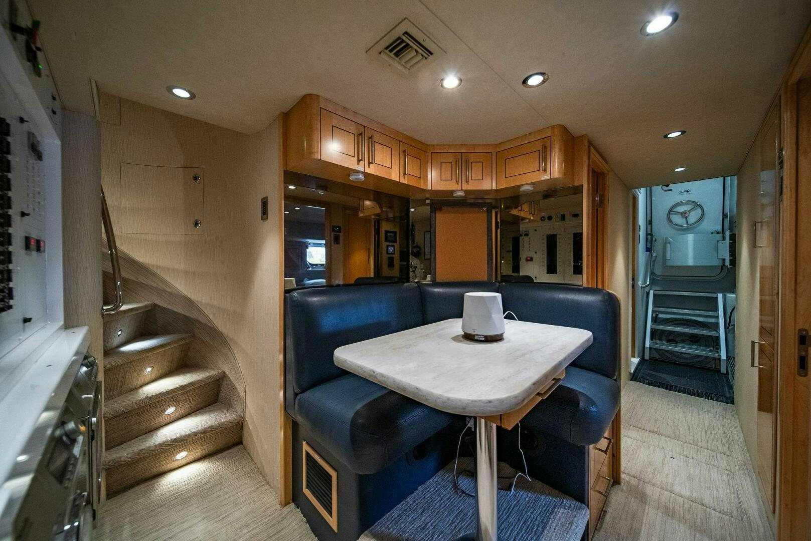 a kitchen and dining area aboard JEANNIETINI NAME RESERVED Yacht for Sale