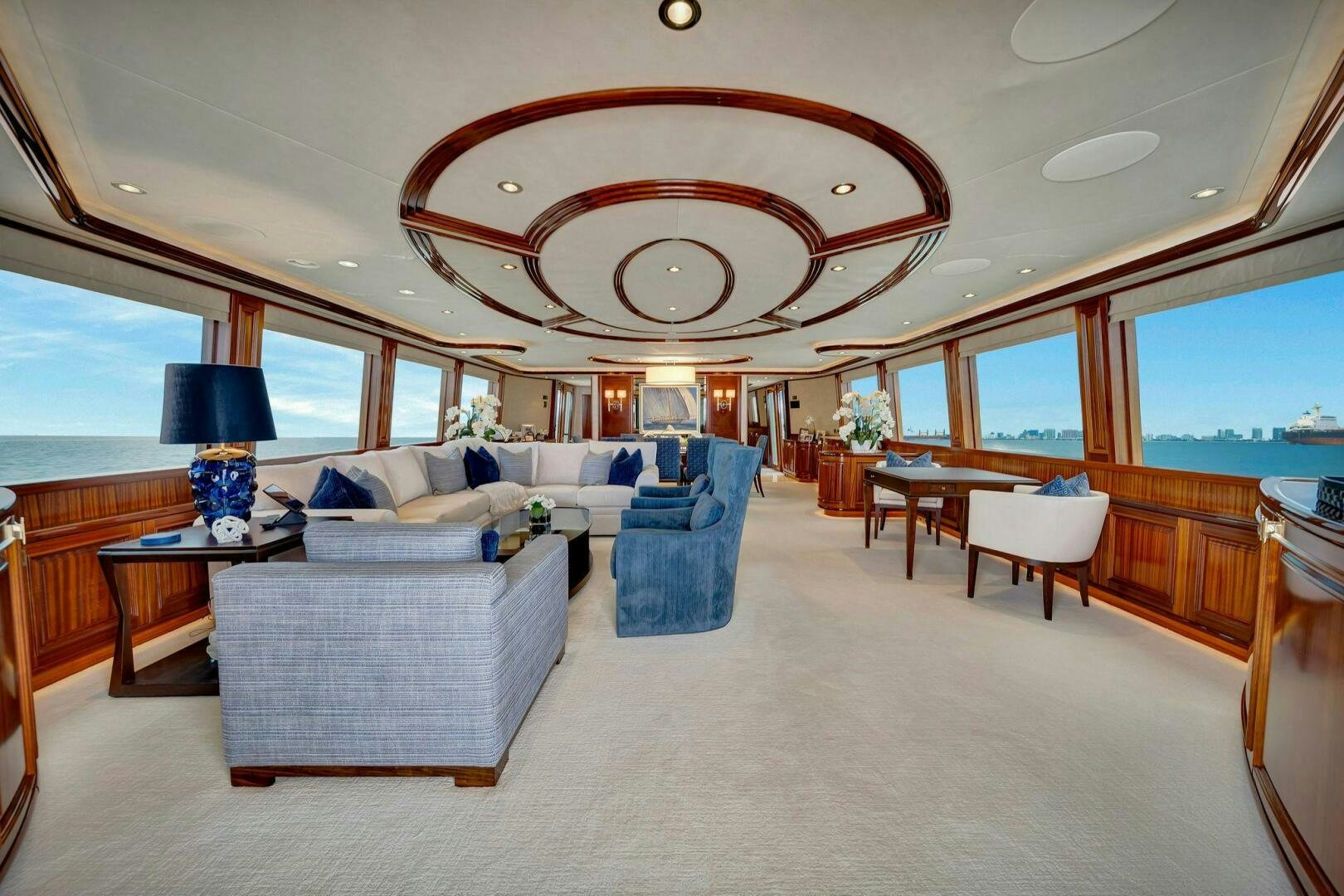 a large living room with a large open window aboard JEANNIETINI NAME RESERVED Yacht for Sale