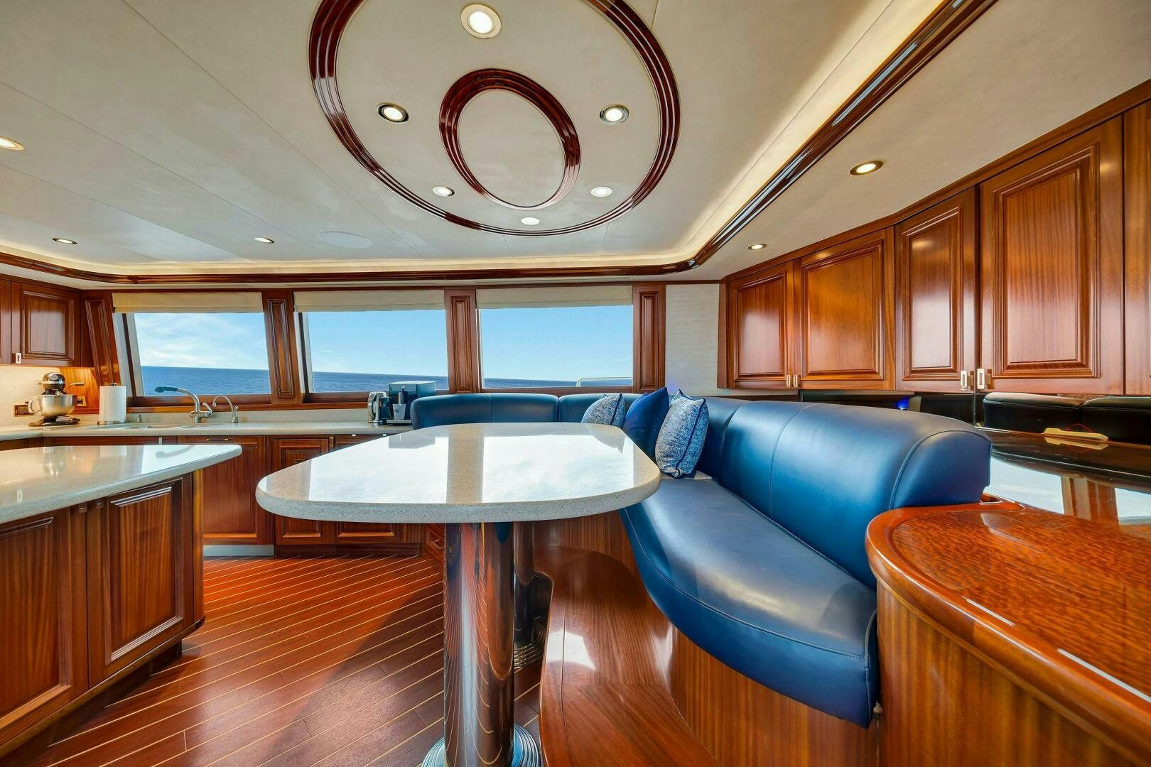 a kitchen with a large dining table aboard JEANNIETINI NAME RESERVED Yacht for Sale