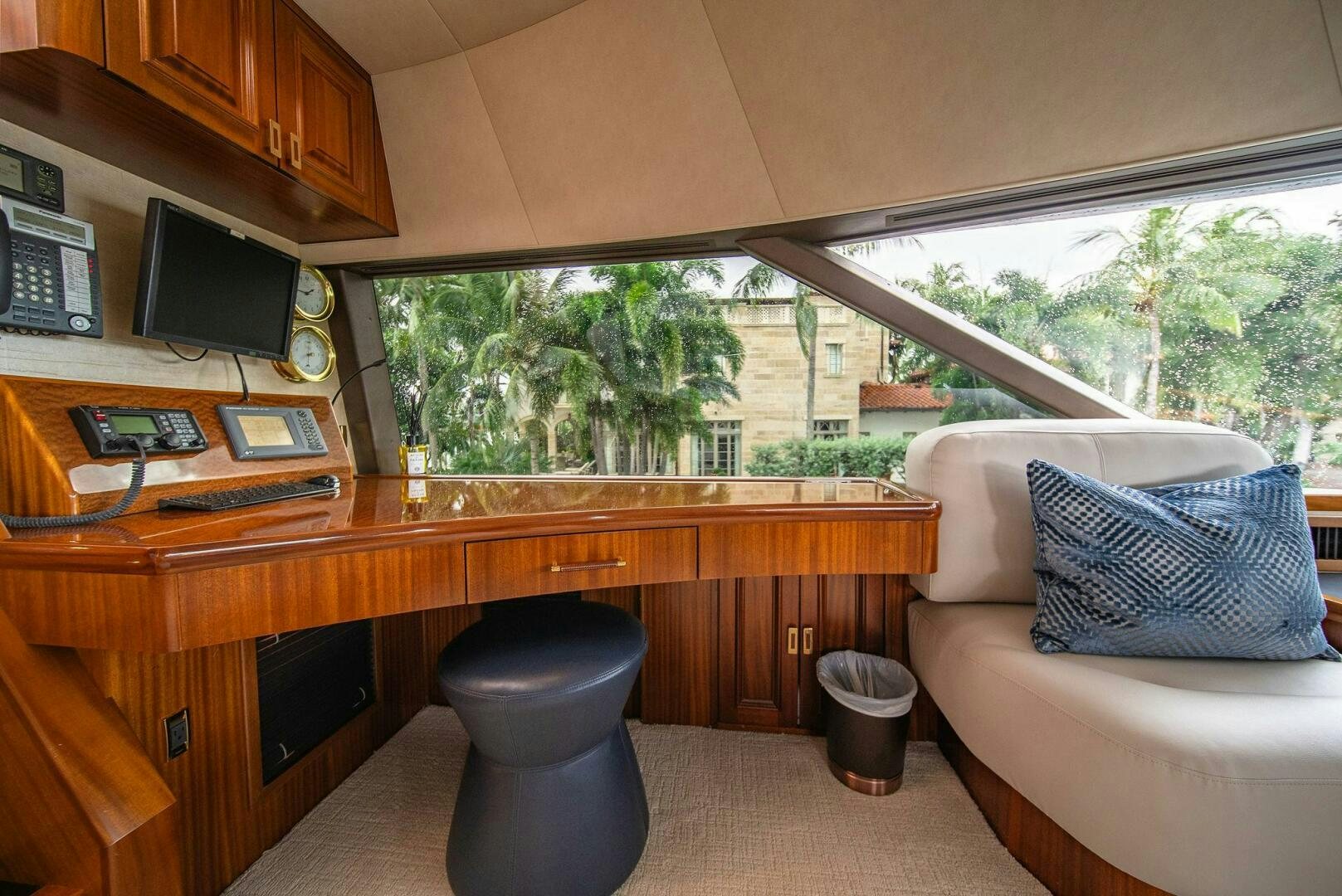 a living room with a couch and a tv aboard JEANNIETINI NAME RESERVED Yacht for Sale